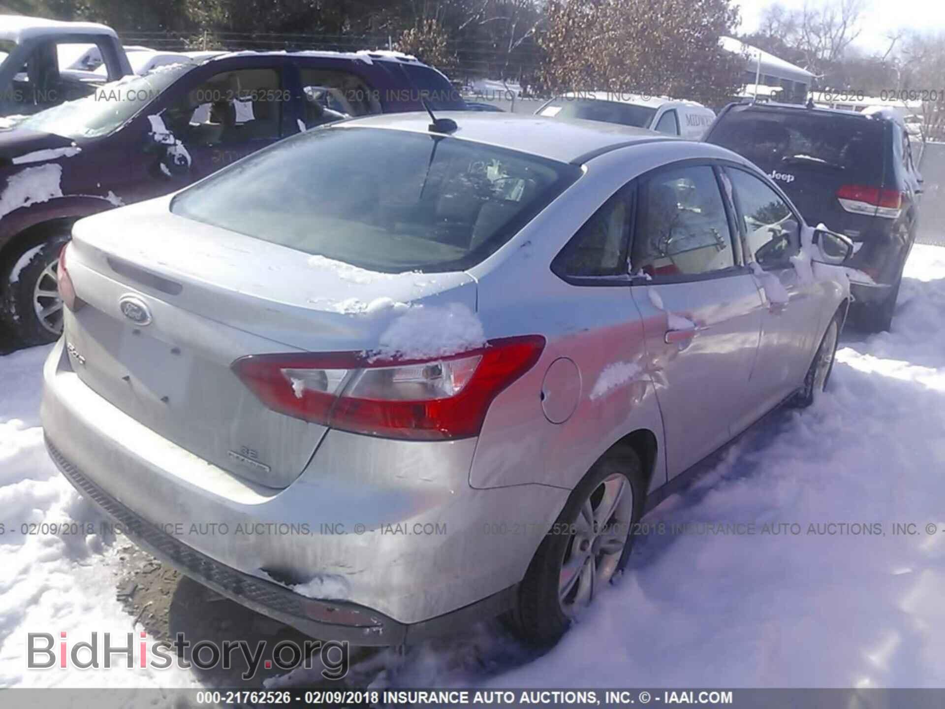 2014 Ford Focus - VIN: 1FADP3F2XEL131438 - Photo 4