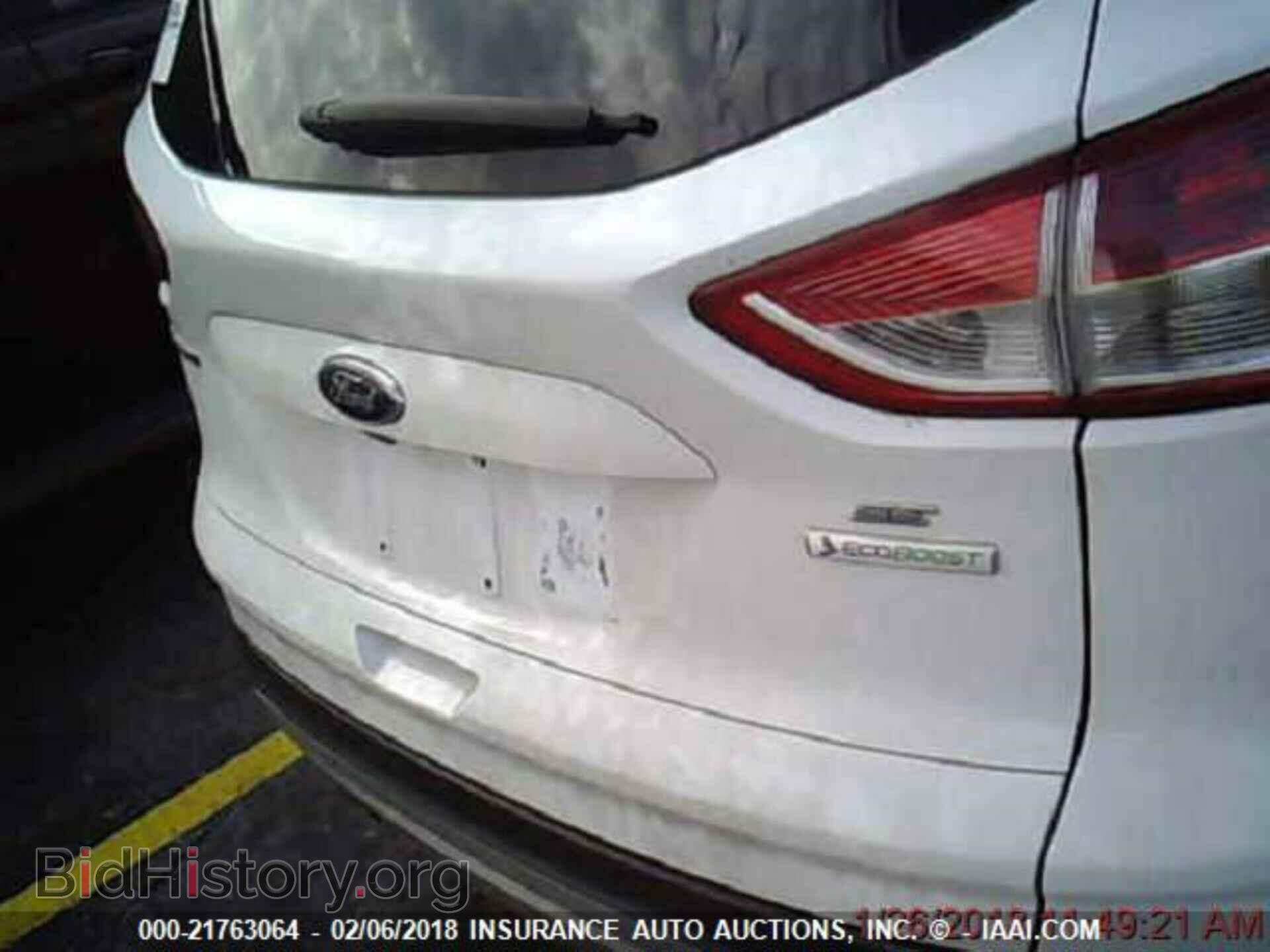 2014 Ford Escape - VIN: 1FMCU0GX4EUD67077 - Photo 4