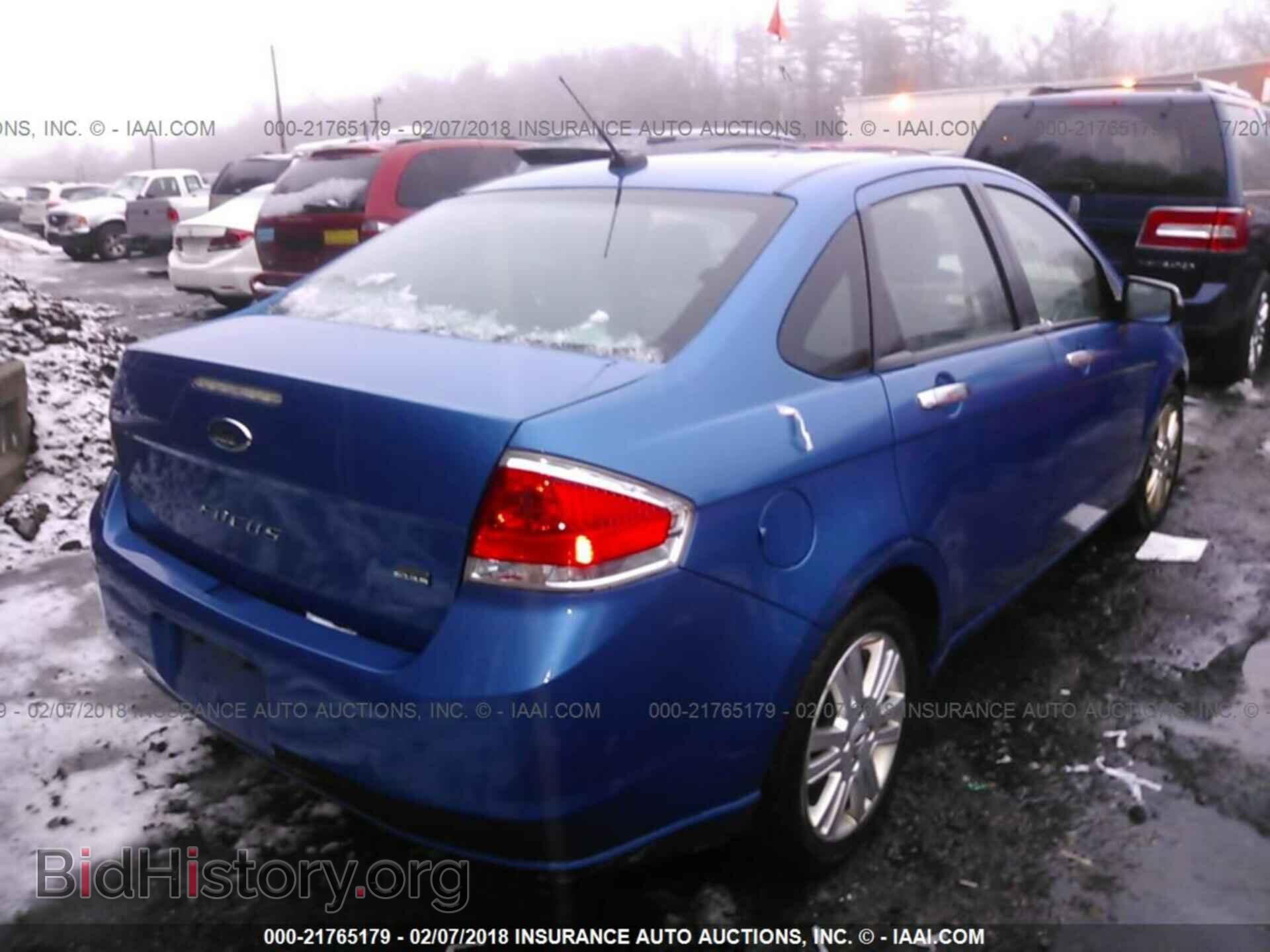 2011 Ford Focus - VIN: 1FAHP3HN5BW199455 - Photo 4