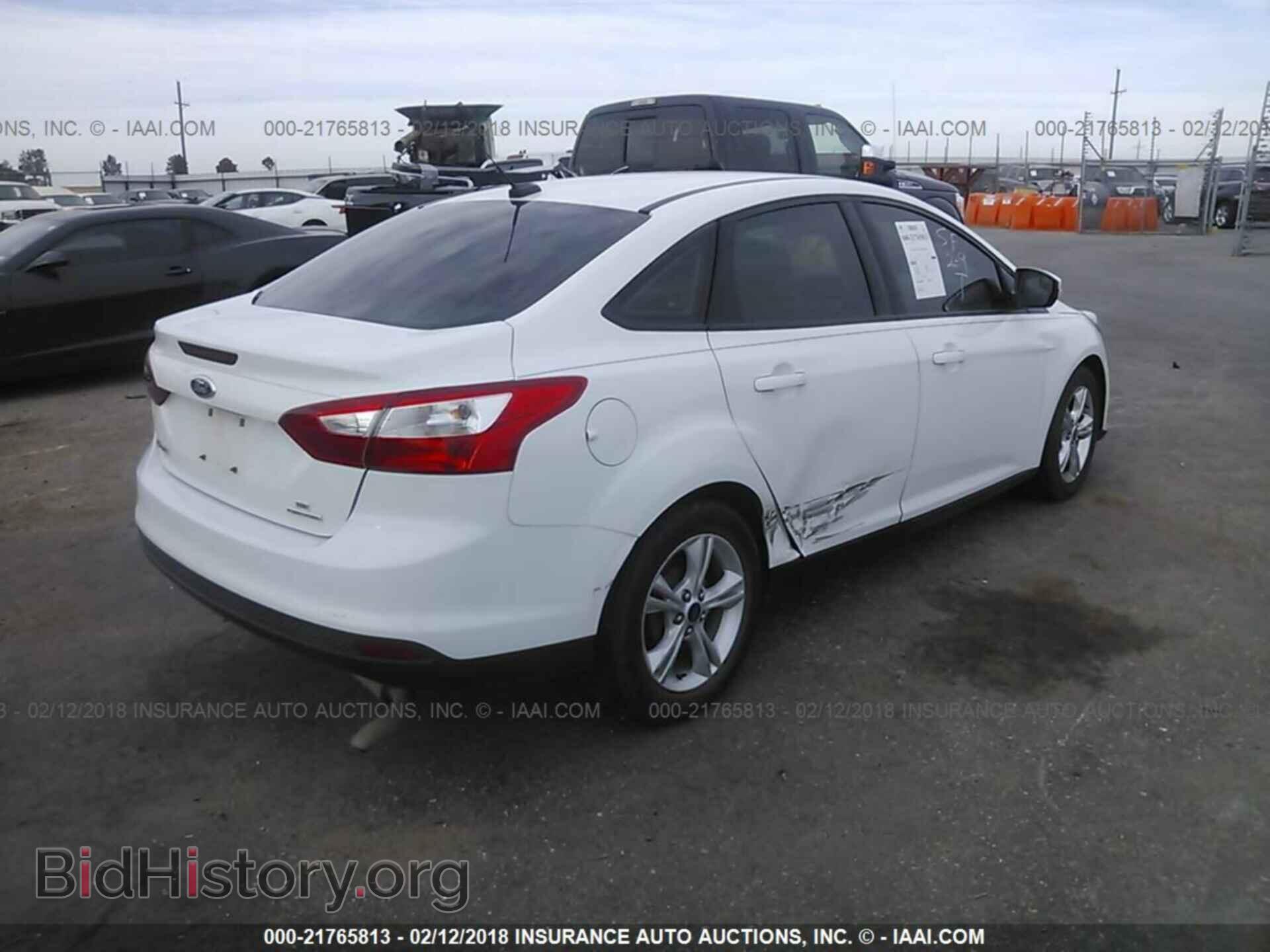 2014 Ford Focus - VIN: 1FADP3F25EL440525 - Фото 4