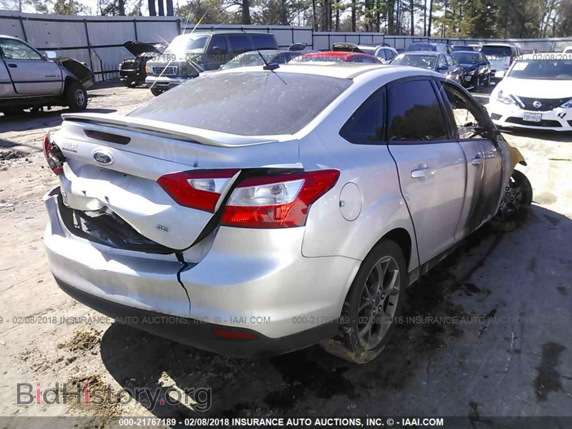 2014 Ford Focus - VIN: 1FADP3F25EL325942 - Photo 4
