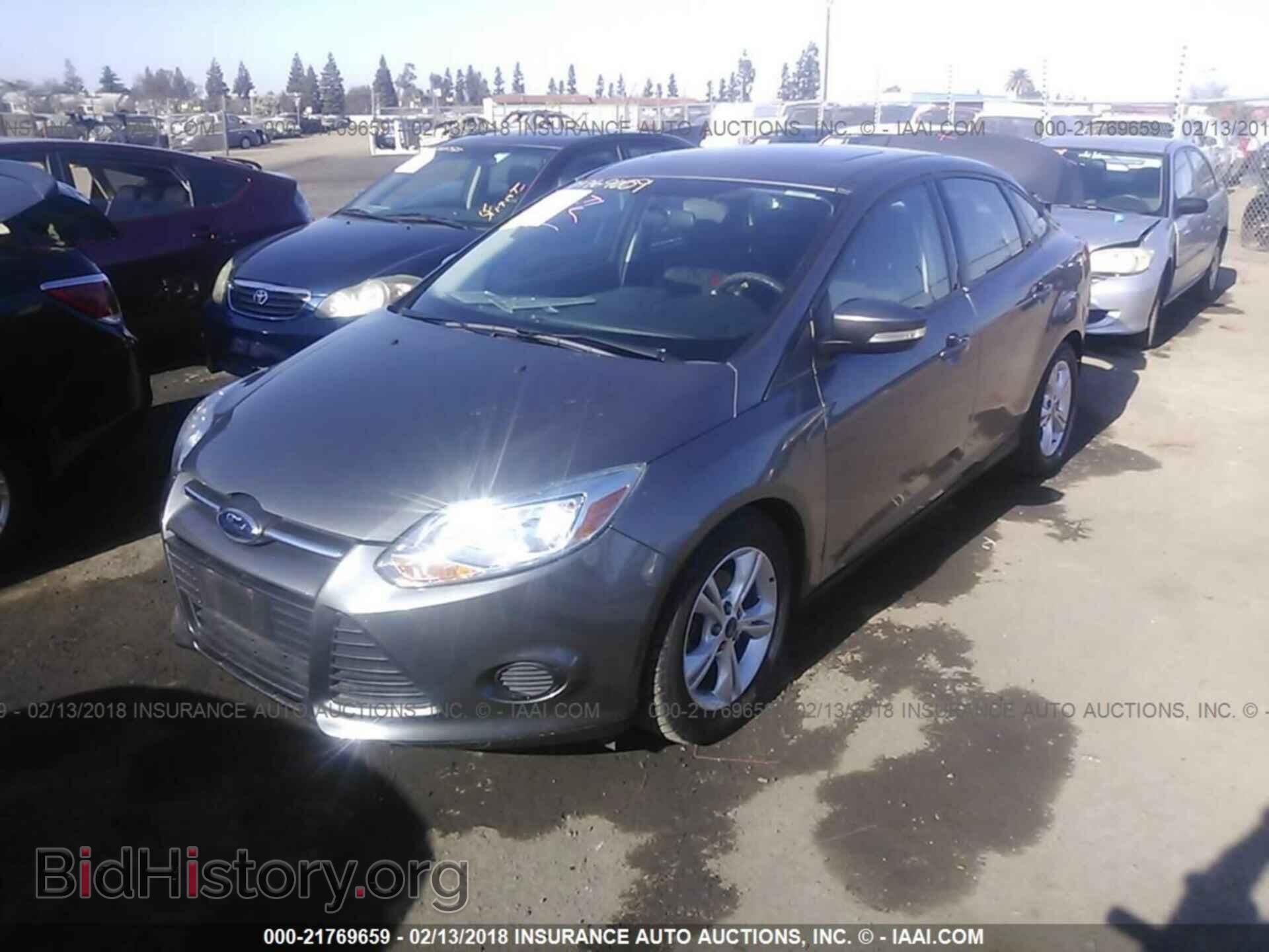2014 Ford Focus - VIN: 1FADP3F22EL332458 - Photo 2
