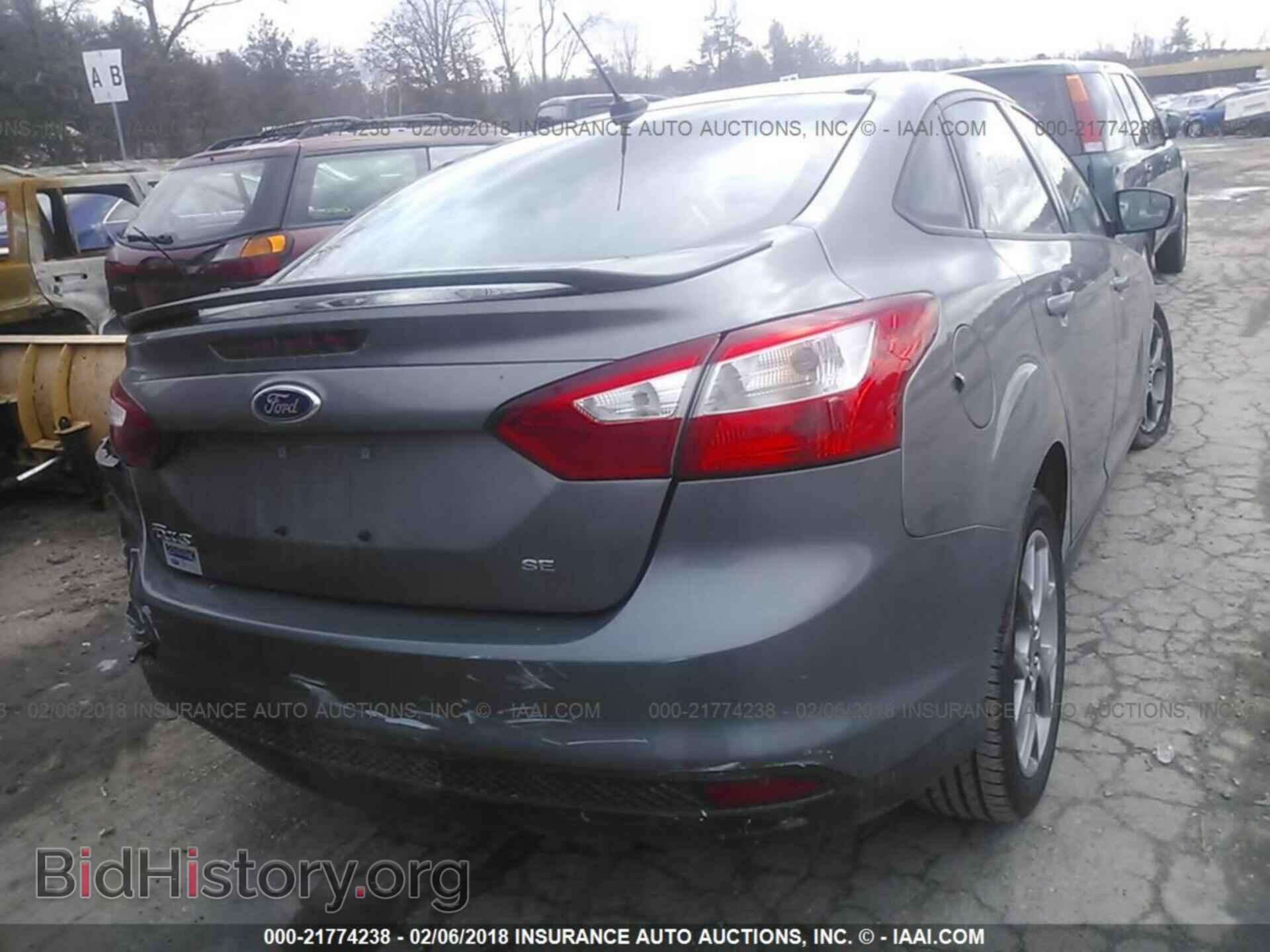 2014 Ford Focus - VIN: 1FADP3F25EL188503 - Фото 4
