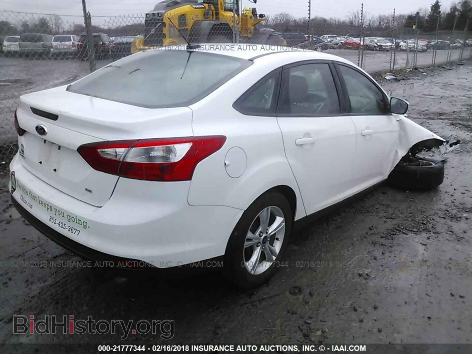2014 Ford Focus - VIN: 1FADP3F27EL339485 - Фото 4