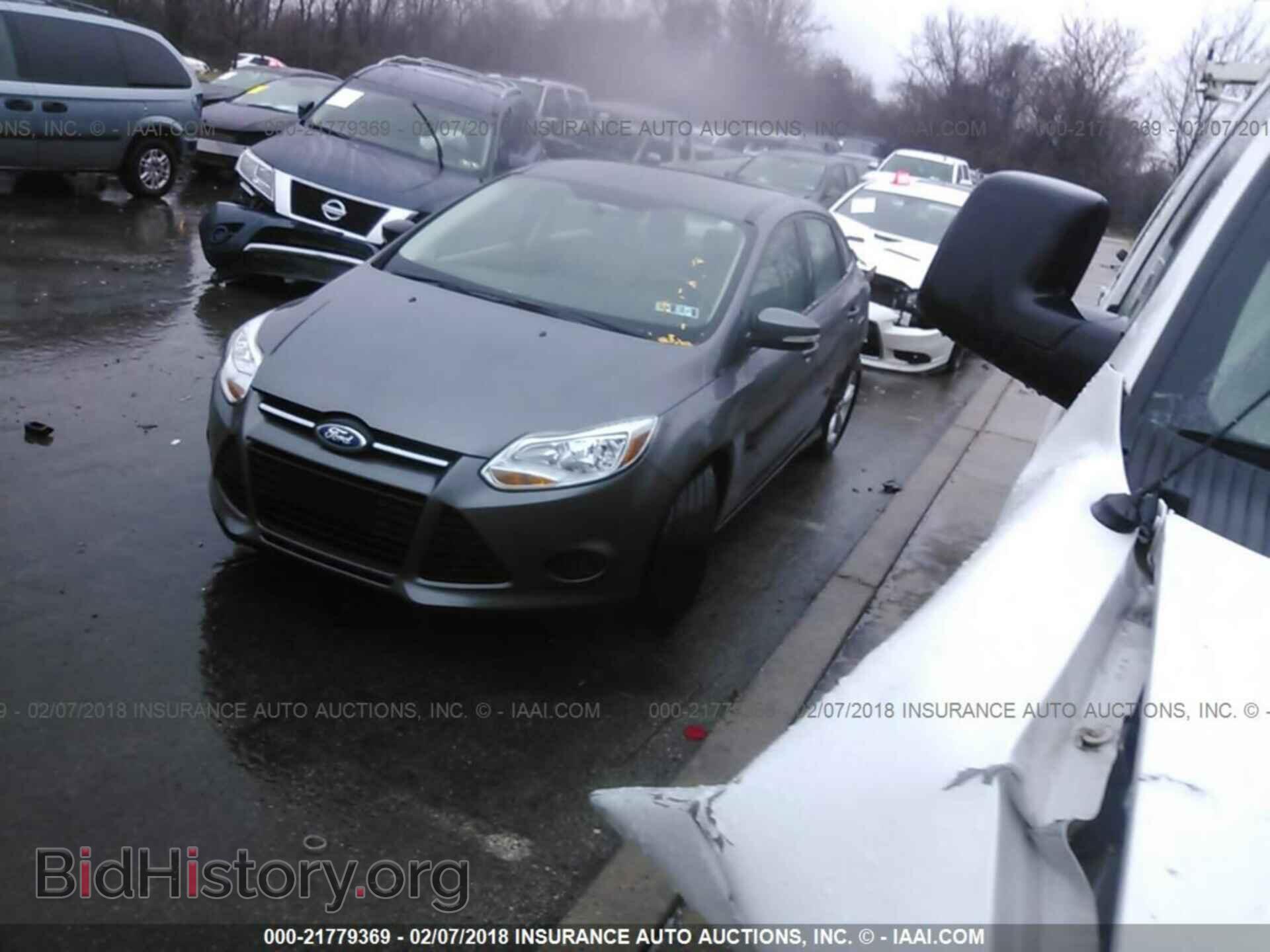 2014 Ford Focus - VIN: 1FADP3F26EL436886 - Фото 2