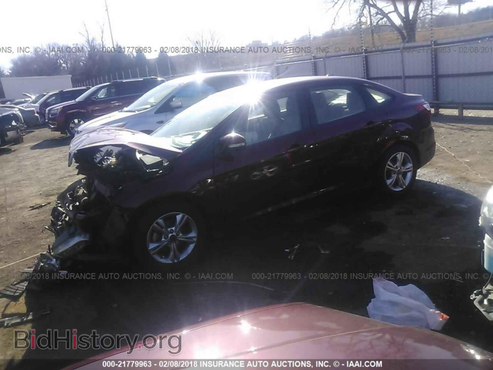 2014 Ford Focus - VIN: 1FADP3F28EL143779 - Photo 2