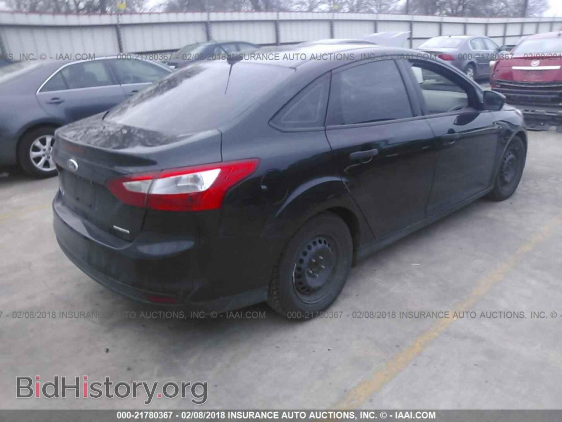2014 Ford Focus - VIN: 1FADP3E26EL311257 - Photo 4