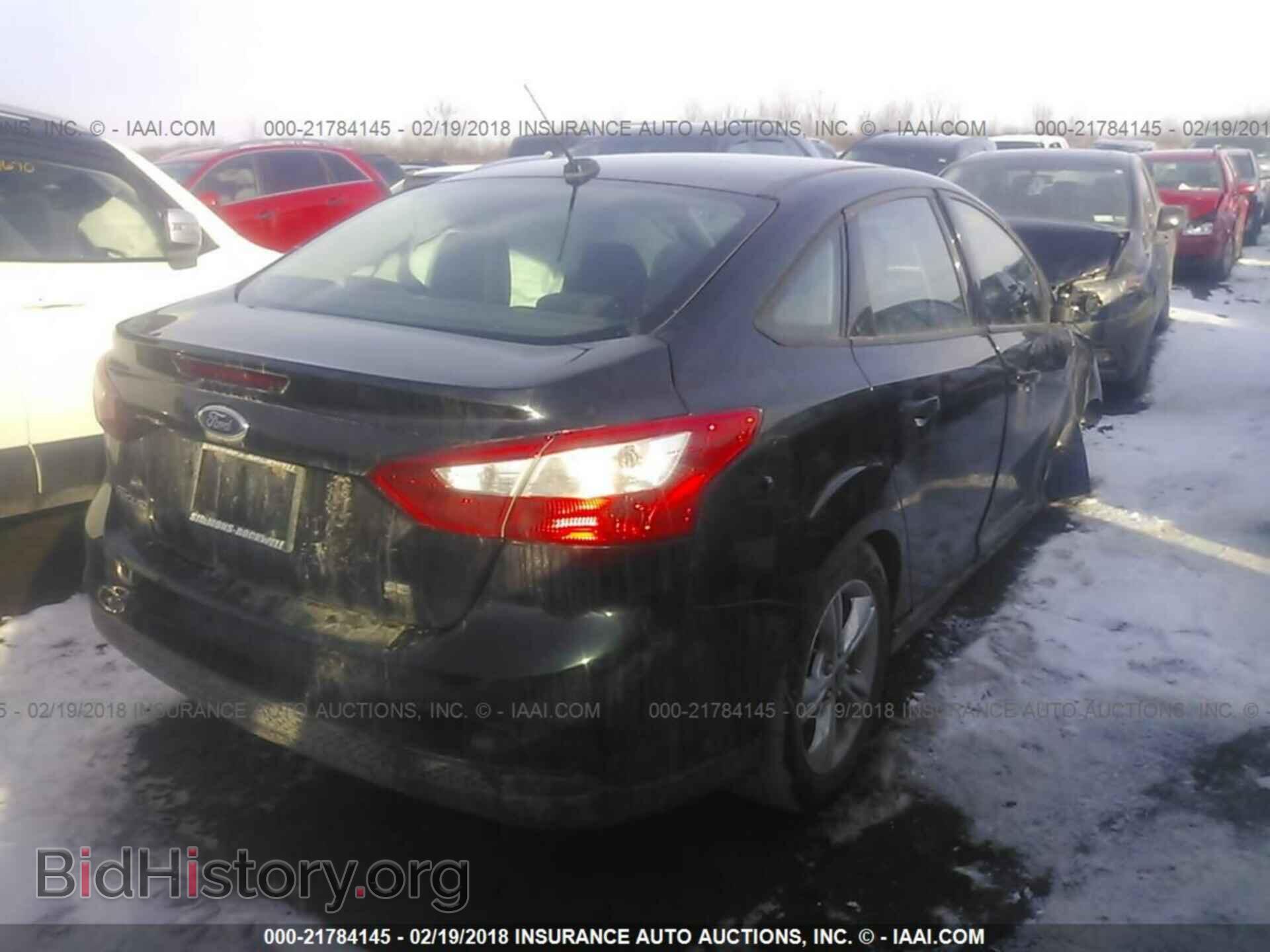 2014 Ford Focus - VIN: 1FADP3F23EL152373 - Фото 4