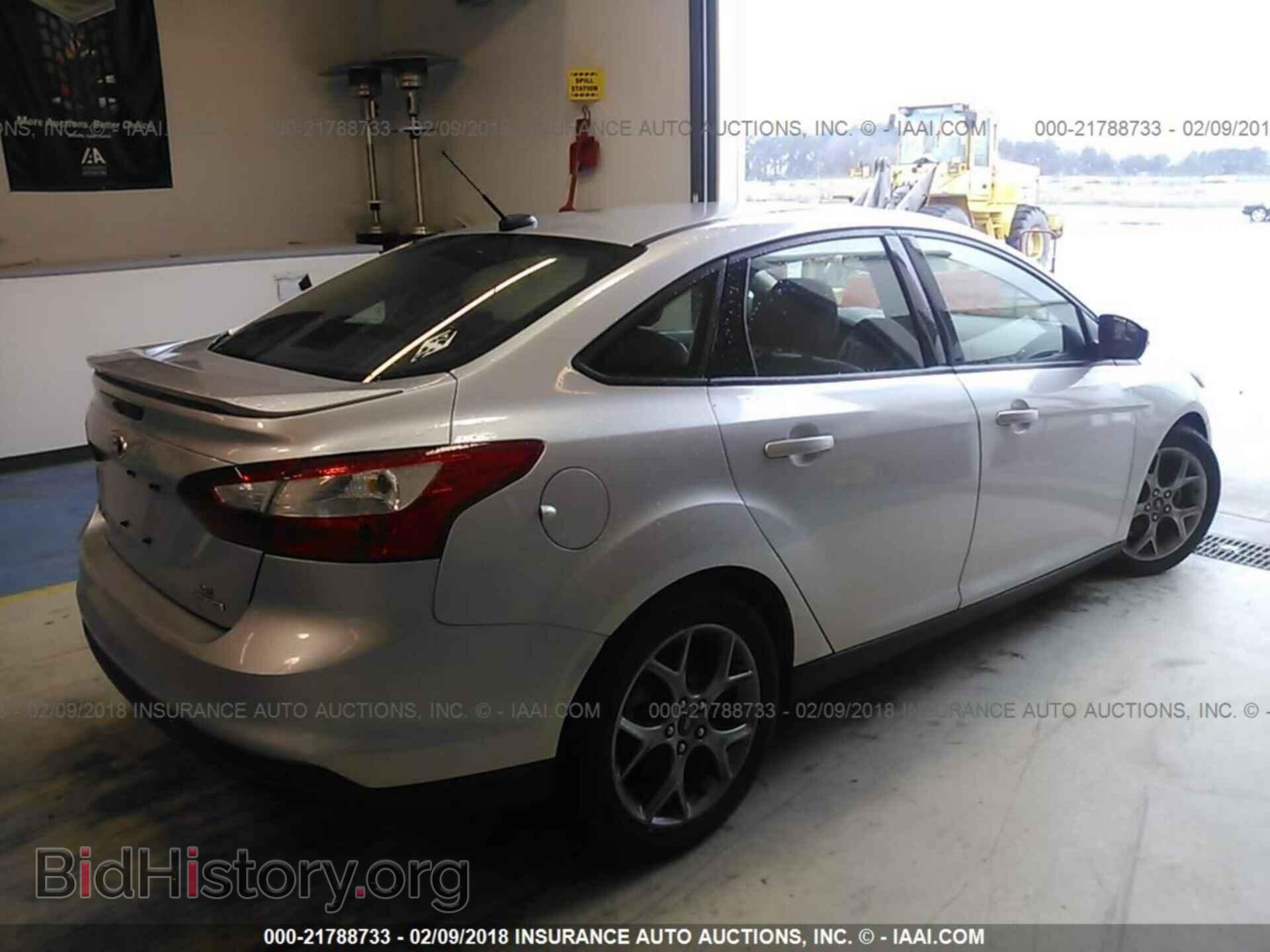 2014 Ford Focus - VIN: 1FADP3F29EL402831 - Photo 4