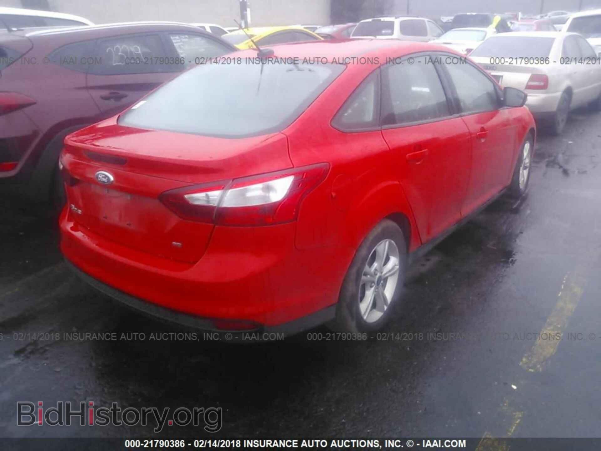 2014 Ford Focus - VIN: 1FADP3F27EL319348 - Photo 4