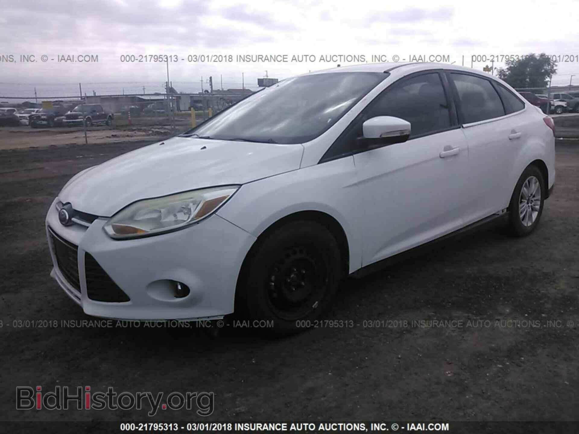 2012 Ford Focus - VIN: 1FAHP3H29CL142099 - Photo 2