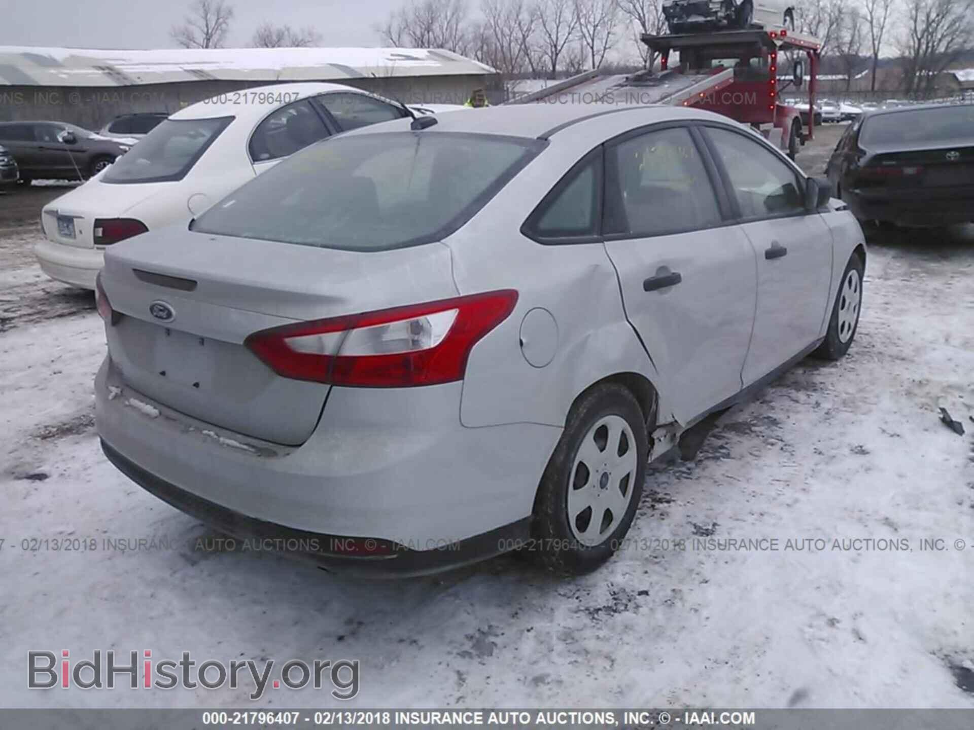 2014 Ford Focus - VIN: 1FADP3E24EL363194 - Photo 4