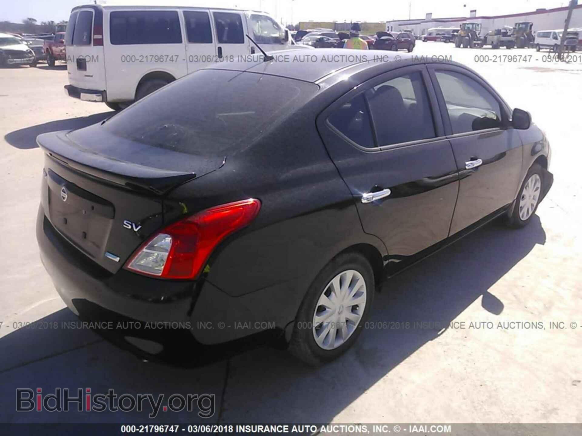 2014 Nissan Versa - VIN: 3N1CN7AP2EL801058 - Фото 4