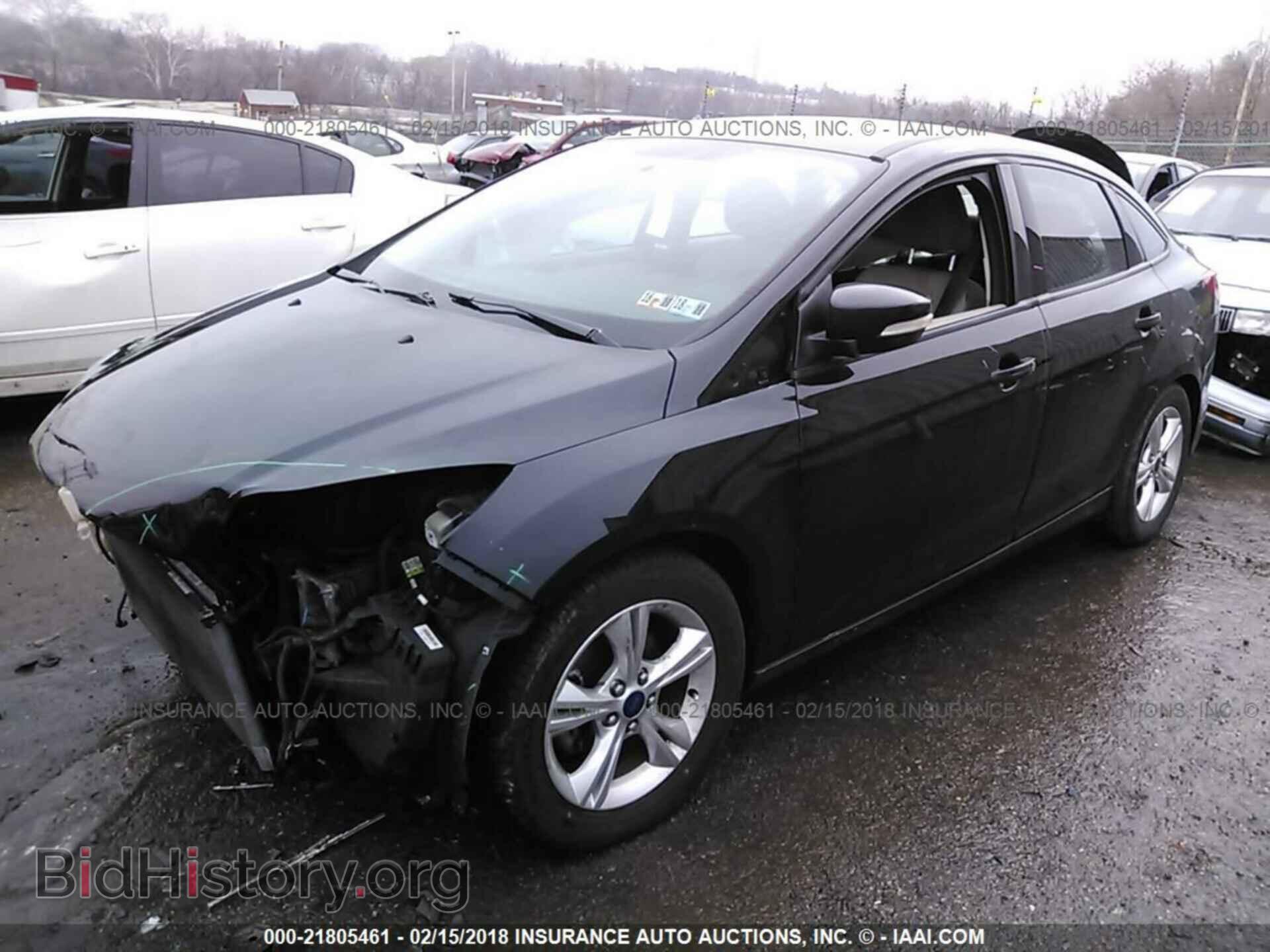 2014 Ford Focus - VIN: 1FADP3F29EL242000 - Фото 2
