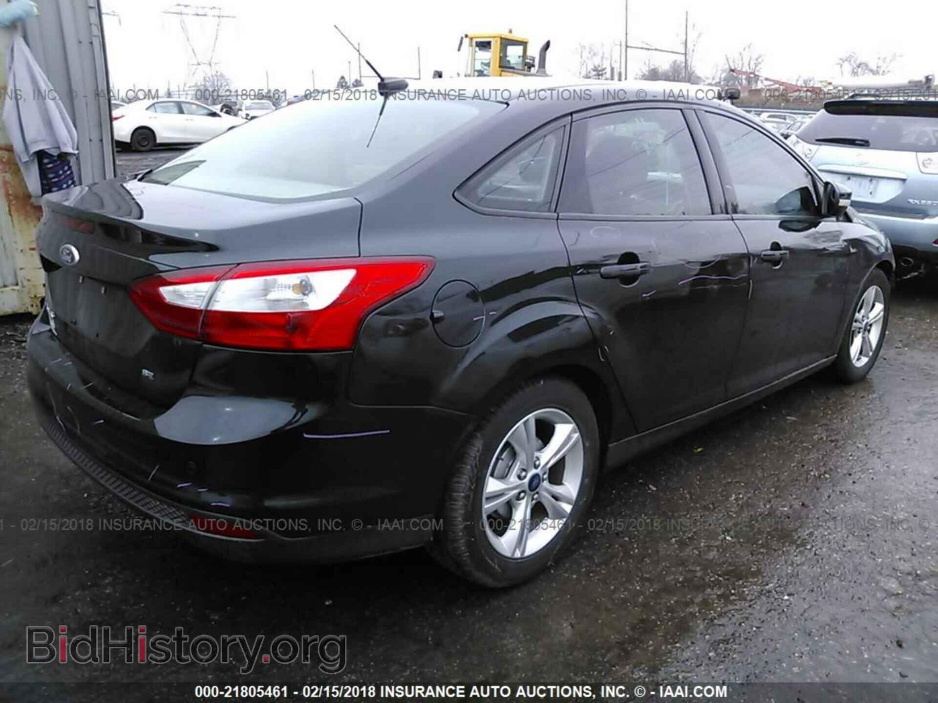 2014 Ford Focus - VIN: 1FADP3F29EL242000 - Фото 4