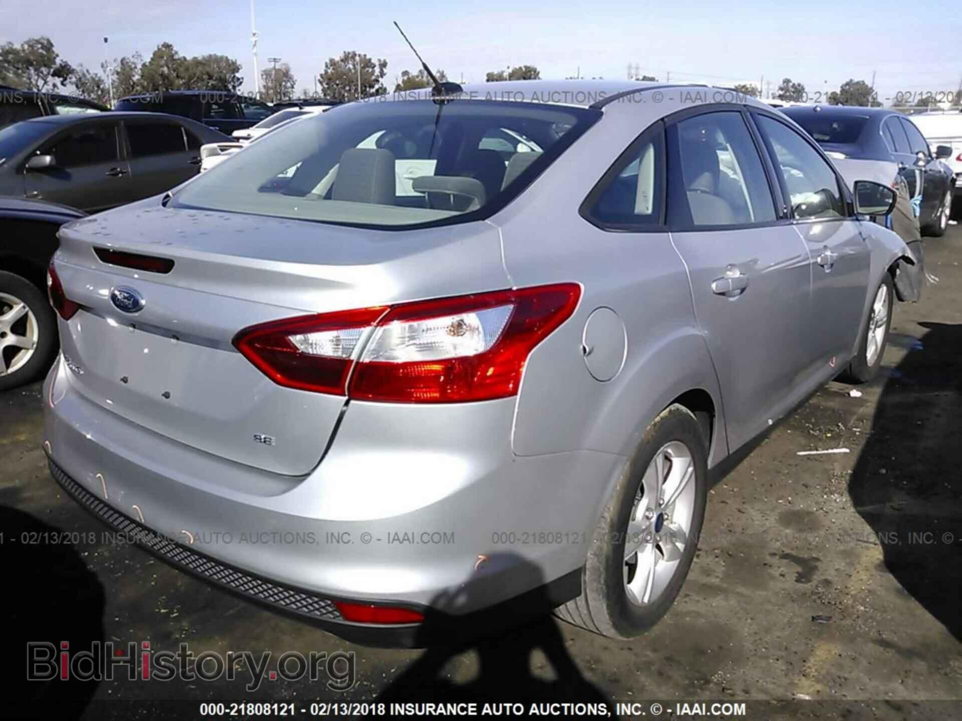 2014 Ford Focus - VIN: 1FADP3F2XEL432940 - Photo 4