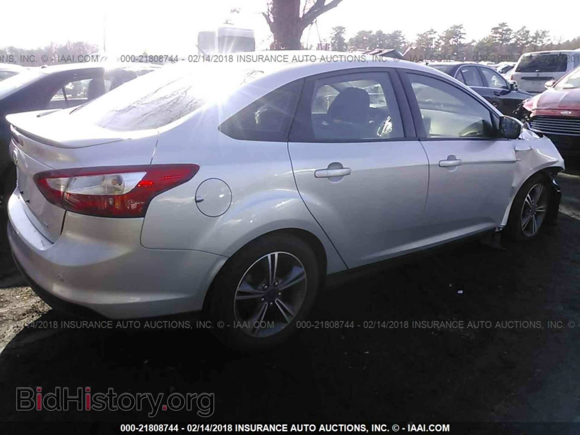 2014 Ford Focus - VIN: 1FADP3F2XEL457000 - Фото 4