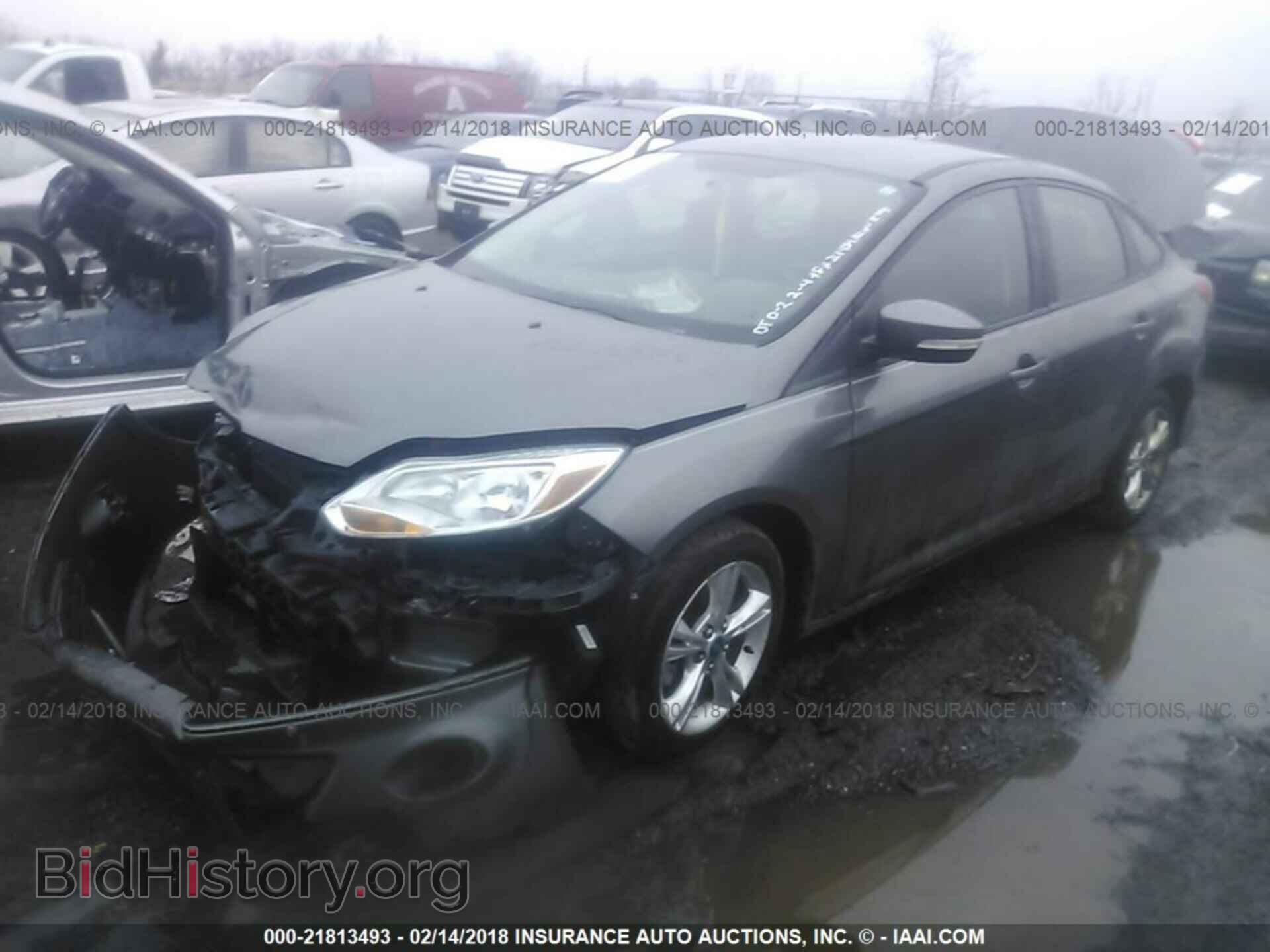 2013 Ford Focus - VIN: 1FADP3F2XDL261489 - Photo 2