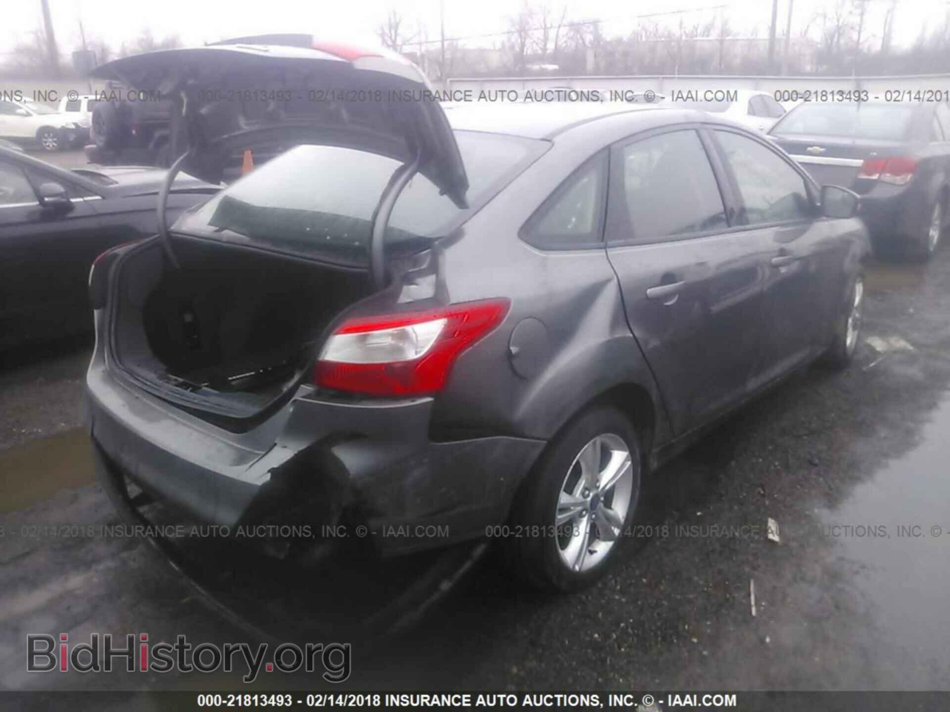 2013 Ford Focus - VIN: 1FADP3F2XDL261489 - Photo 4
