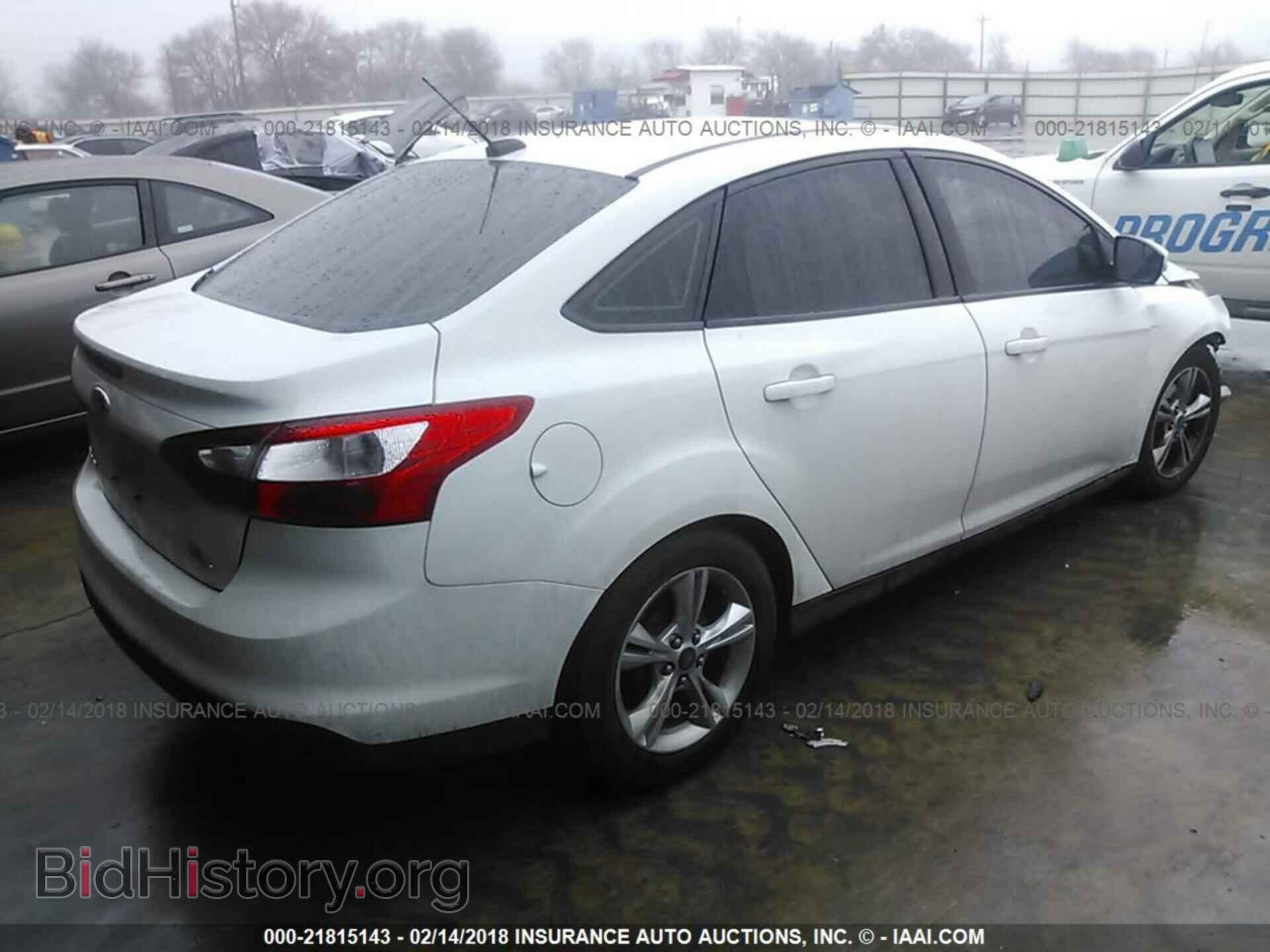 2014 Ford Focus - VIN: 1FADP3F25EL313290 - Фото 4