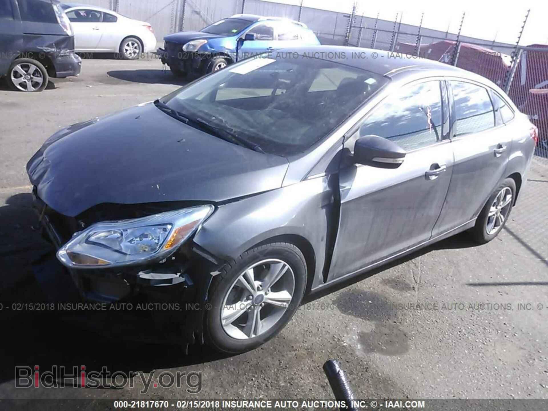 2014 Ford Focus - VIN: 1FADP3F29EL234530 - Фото 2