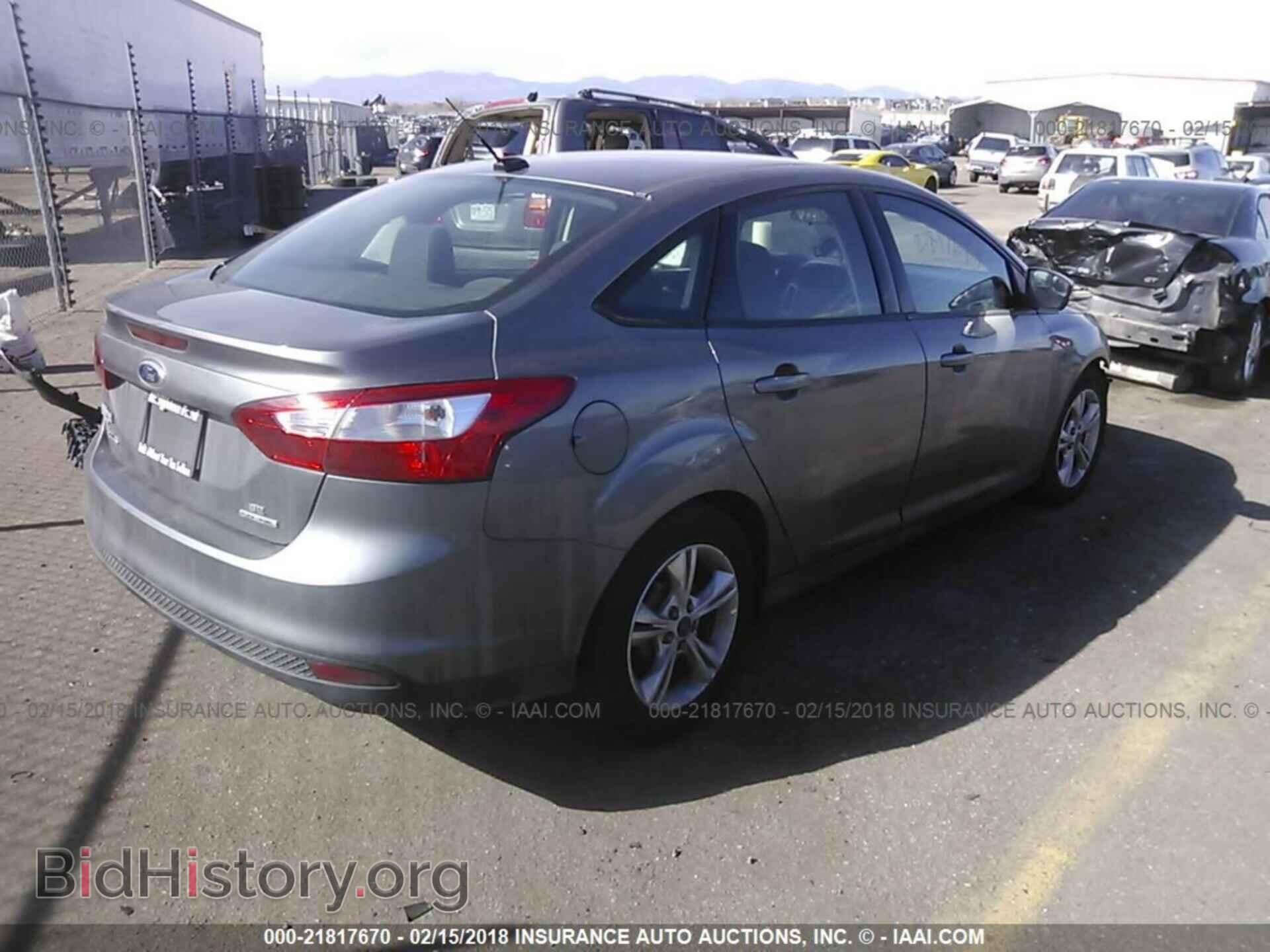 2014 Ford Focus - VIN: 1FADP3F29EL234530 - Фото 4