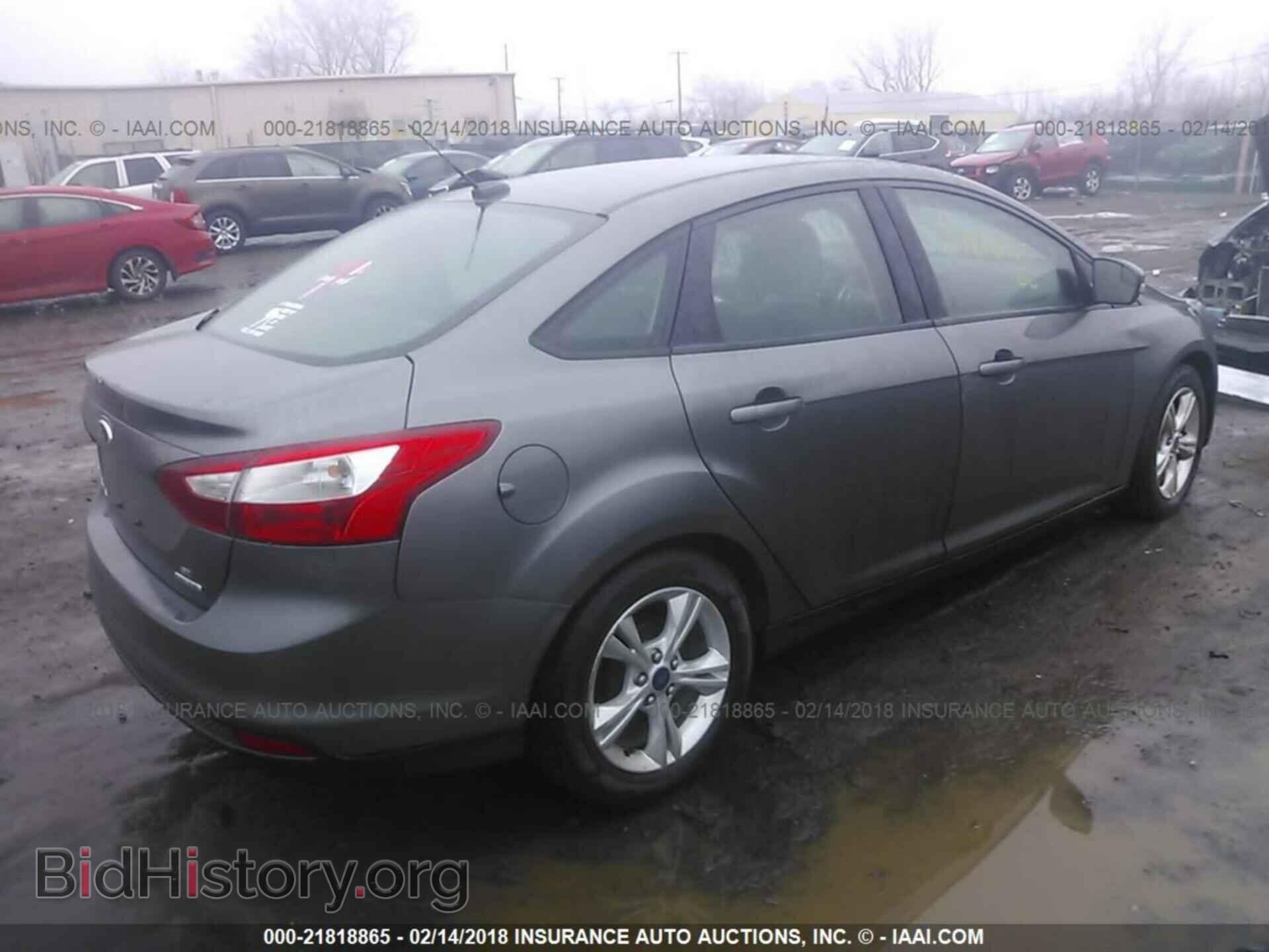 2014 Ford Focus - VIN: 1FADP3F29EL298700 - Фото 4
