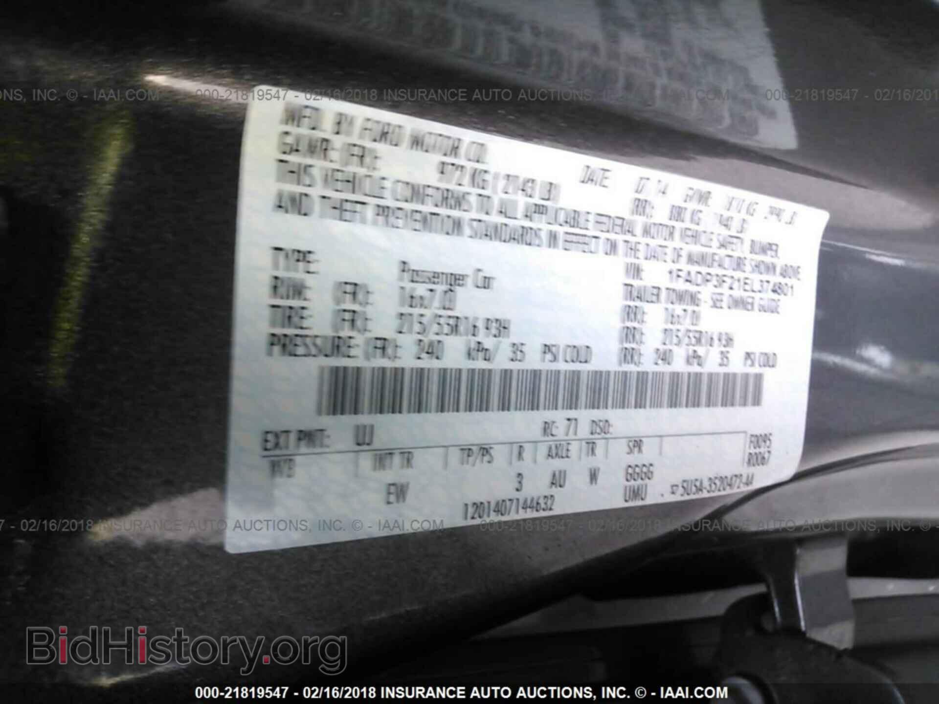 2014 Ford Focus - VIN: 1FADP3F21EL374801 - Photo 9