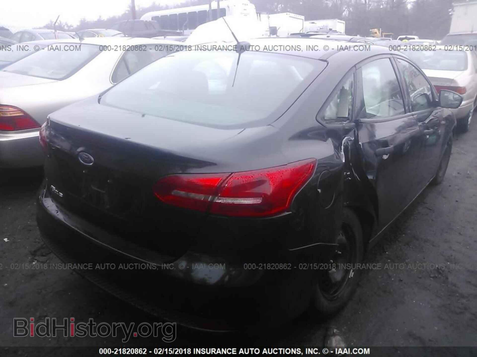 2015 Ford Focus - VIN: 1FADP3E25FL310506 - Photo 4