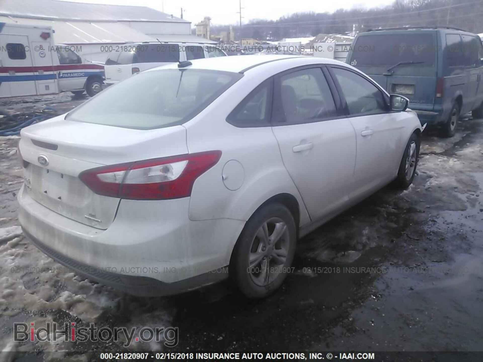 2013 Ford Focus - VIN: 1FADP3F24DL261228 - Фото 4