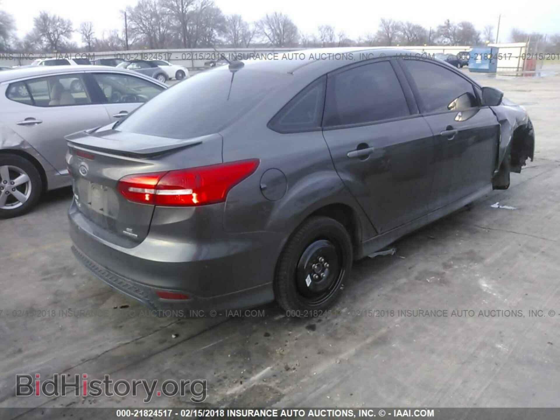 2015 Ford Focus - VIN: 1FADP3F20FL374614 - Photo 4