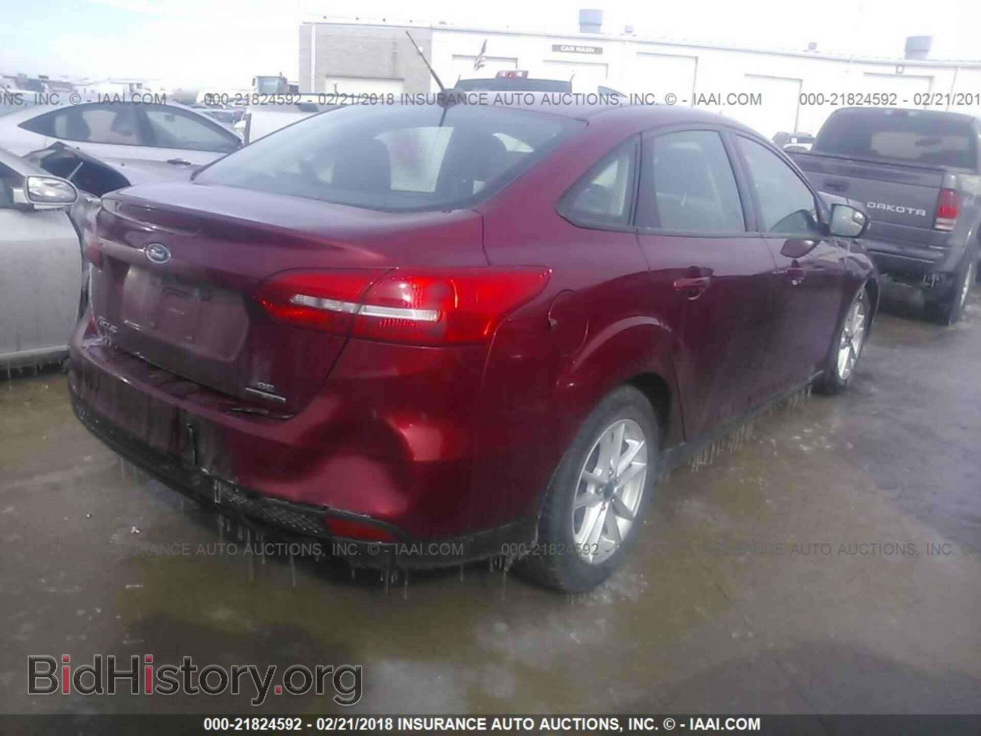 2015 Ford Focus - VIN: 1FADP3F20FL261326 - Photo 4