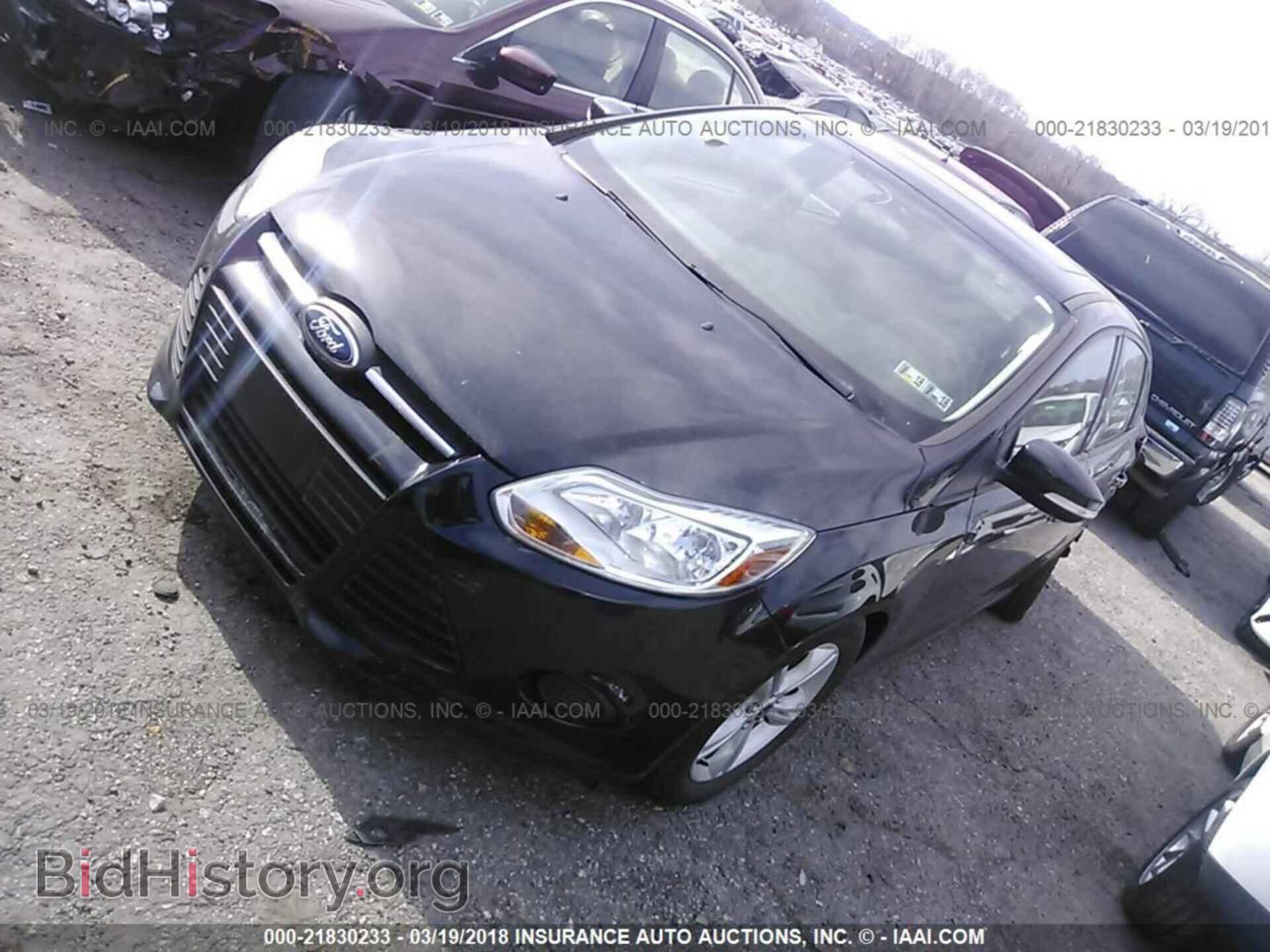 2014 Ford Focus - VIN: 1FADP3F27EL411981 - Фото 2