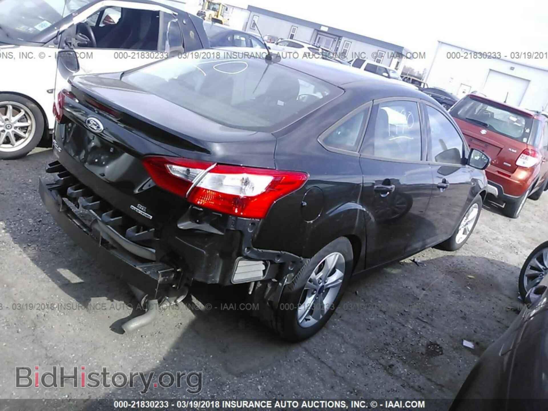 2014 Ford Focus - VIN: 1FADP3F27EL411981 - Фото 4