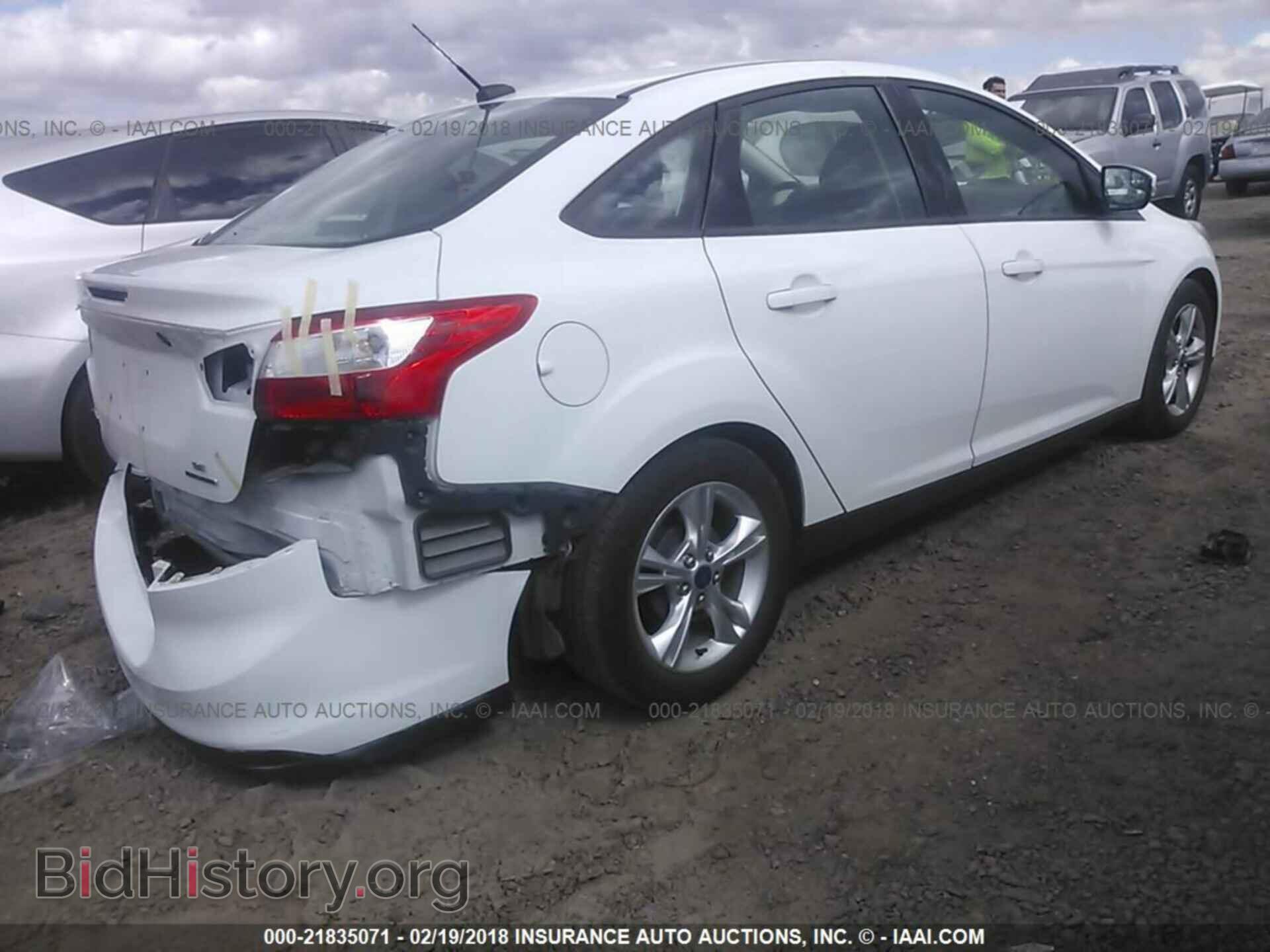 2014 Ford Focus - VIN: 1FADP3F21EL200730 - Photo 4