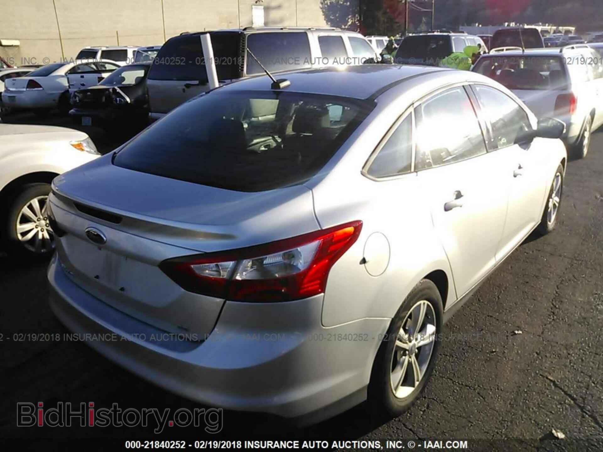 2014 Ford Focus - VIN: 1FADP3F21EL112163 - Photo 4