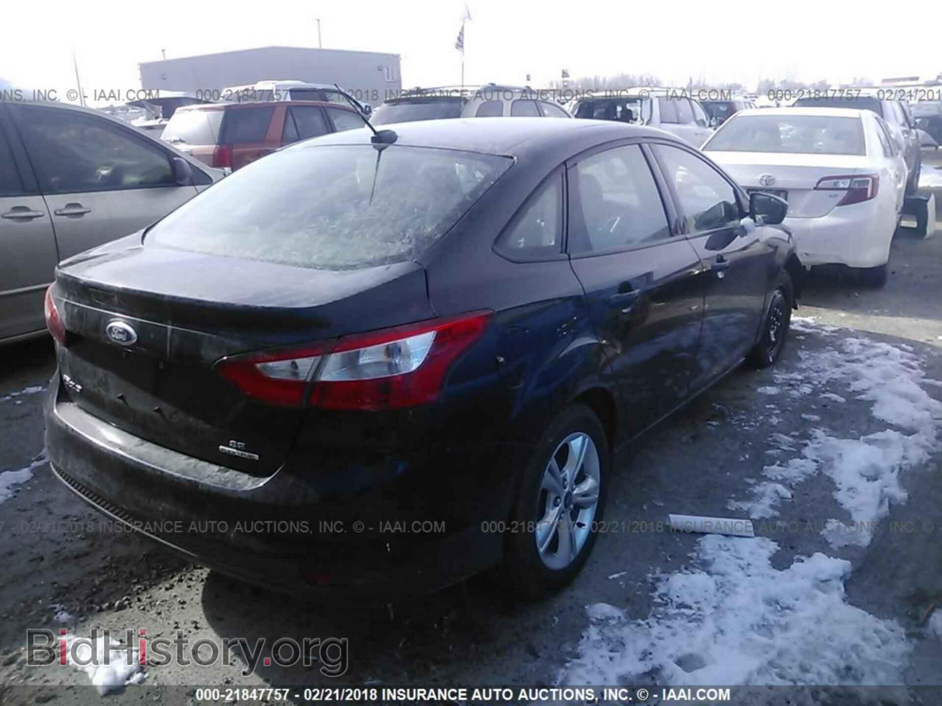 2013 Ford Focus - VIN: 1FADP3F20DL272484 - Photo 4