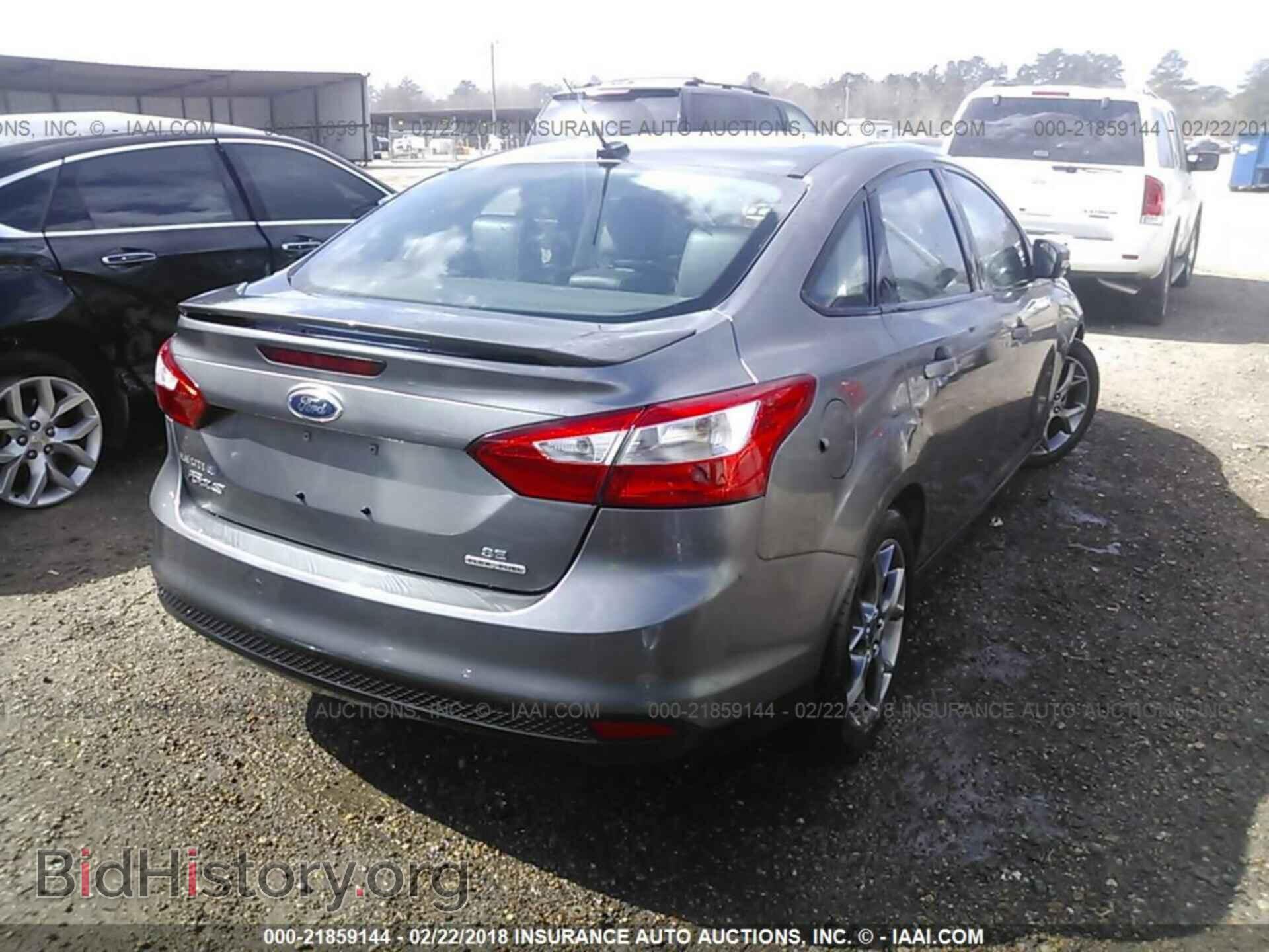 2014 Ford Focus - VIN: 1FADP3F29EL159652 - Фото 4