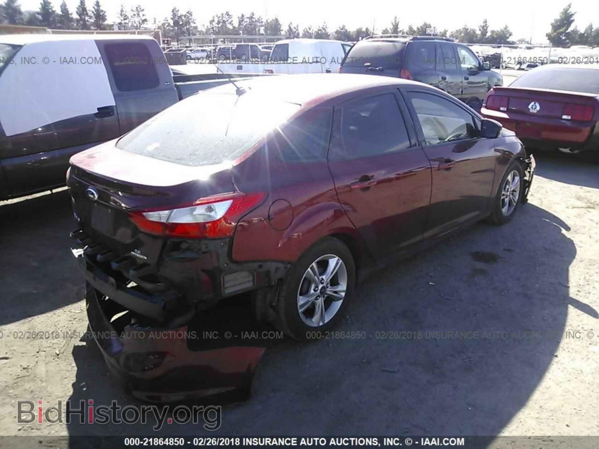 2014 Ford Focus - VIN: 1FADP3F28EL271293 - Photo 4