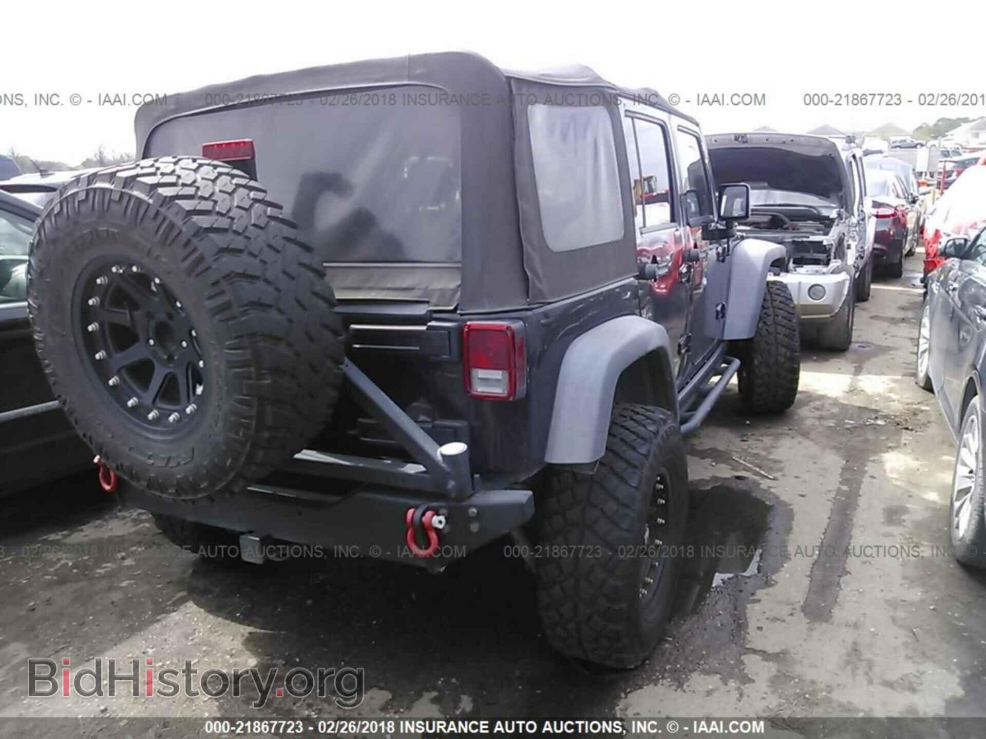 2012 Jeep Wrangler - VIN: 1C4HJWFG9CL157651 - Фото 4