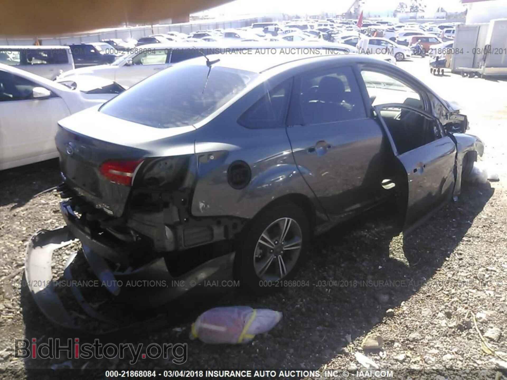 2017 Ford Focus - VIN: 1FADP3FE5HL292813 - Photo 4