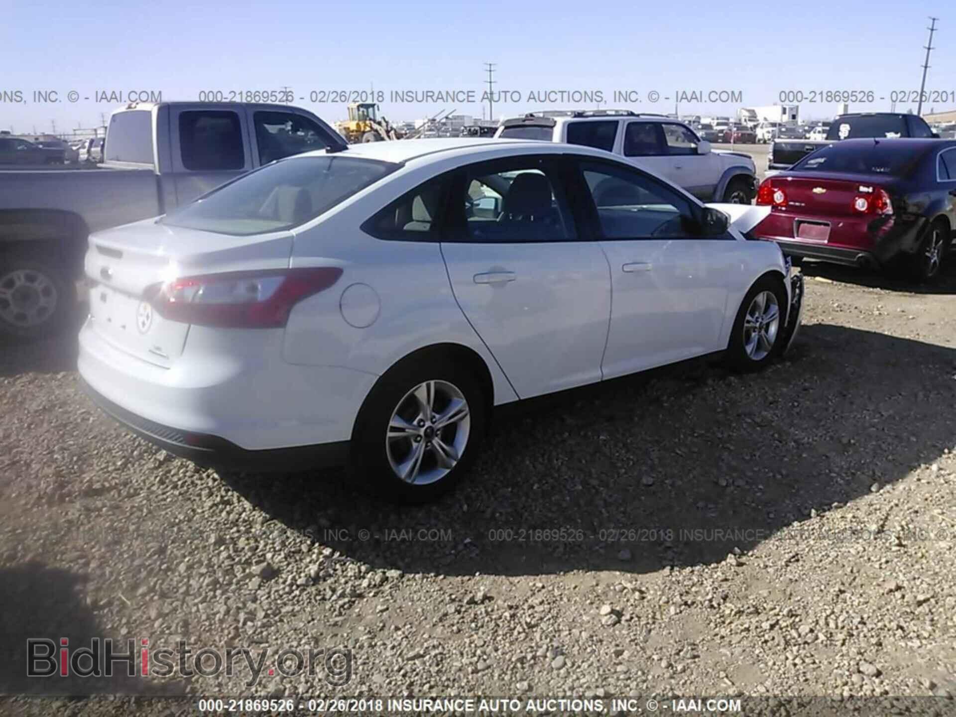 2014 Ford Focus - VIN: 1FADP3F21EL208665 - Photo 4