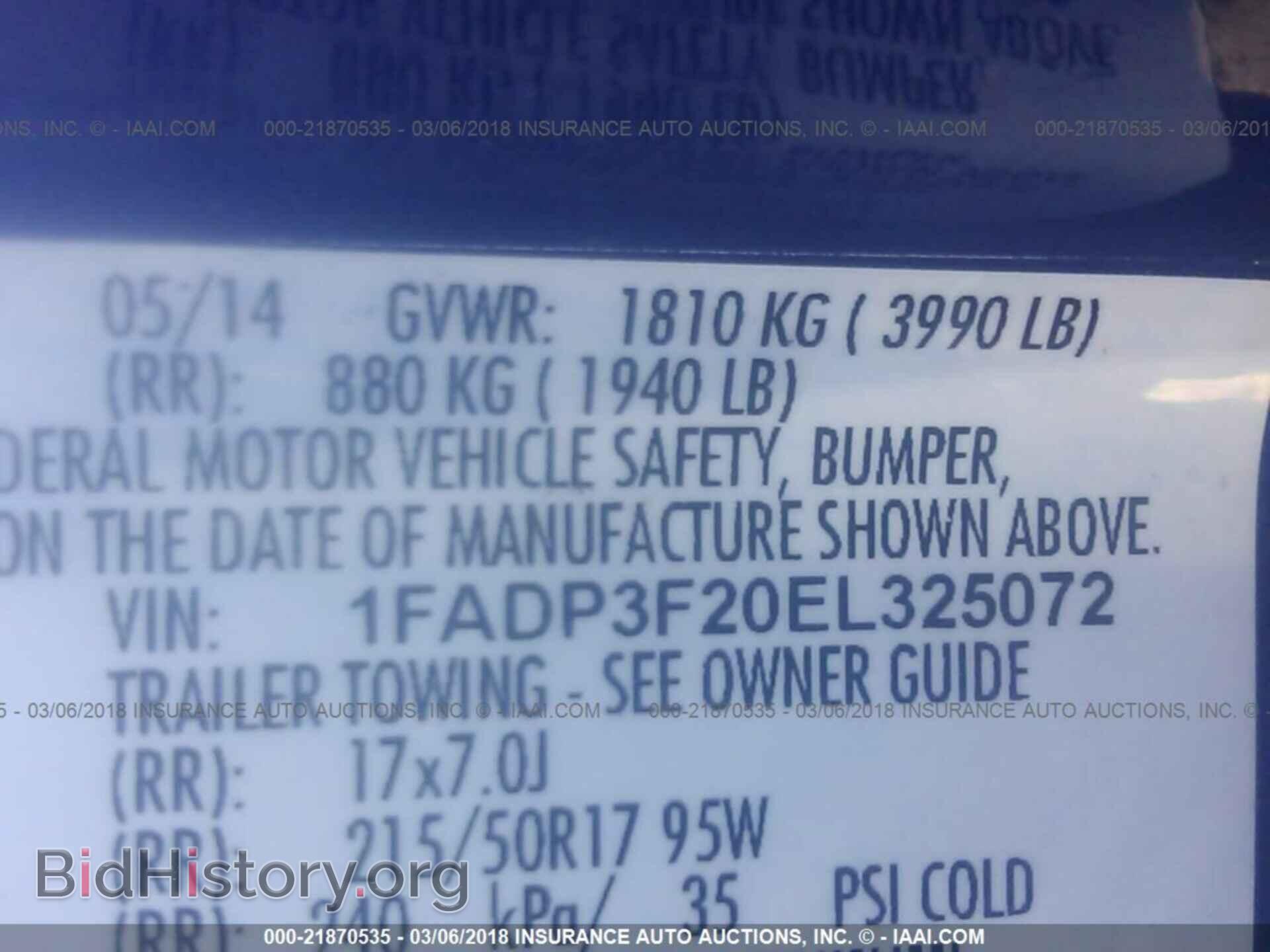 2014 Ford Focus - VIN: 1FADP3F20EL325072 - Фото 9