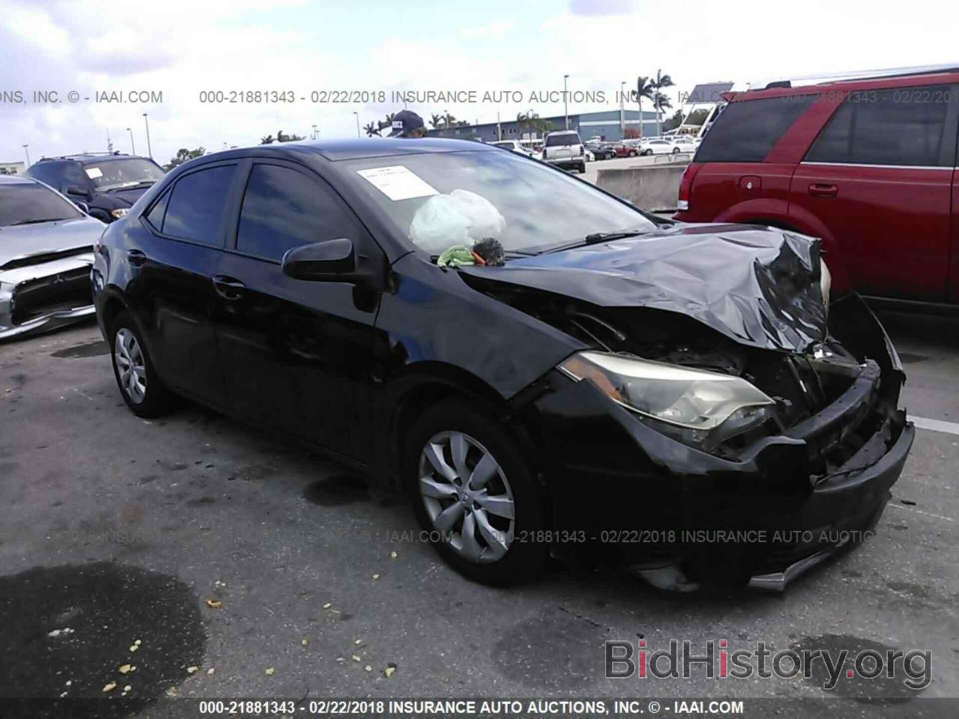 Photo 5YFBURHE6EP100389 - Toyota Corolla 2014