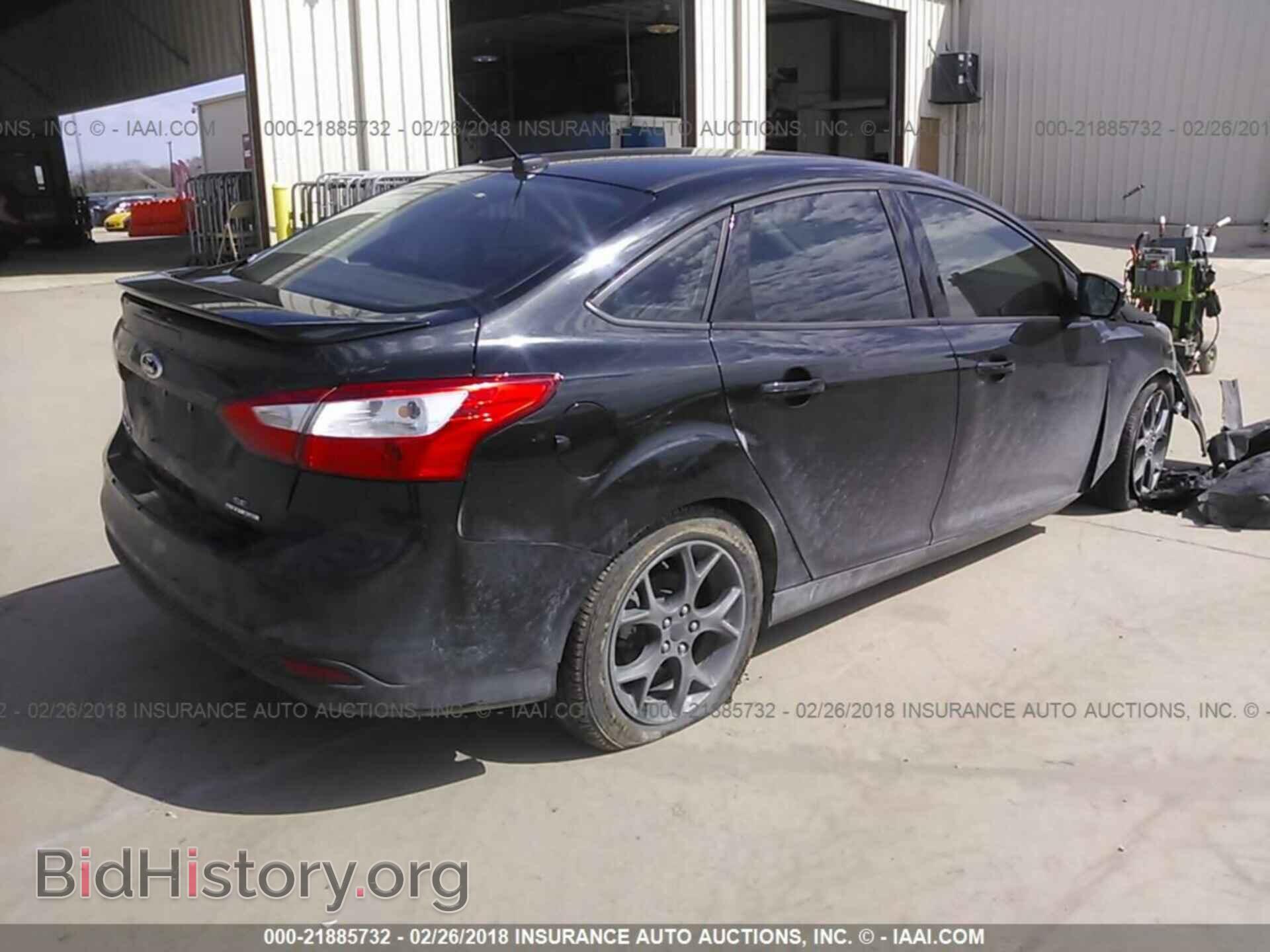2014 Ford Focus - VIN: 1FADP3F25EL296622 - Фото 4