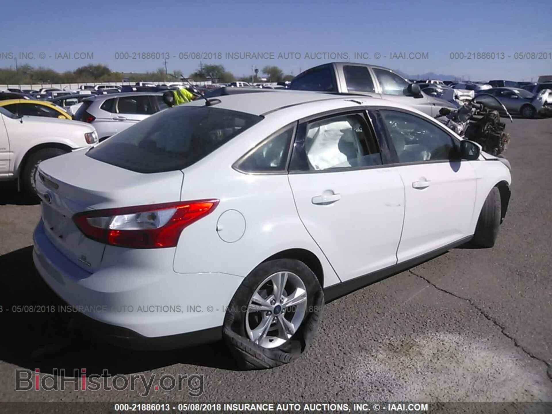 2014 Ford Focus - VIN: 1FADP3F22EL277140 - Photo 4