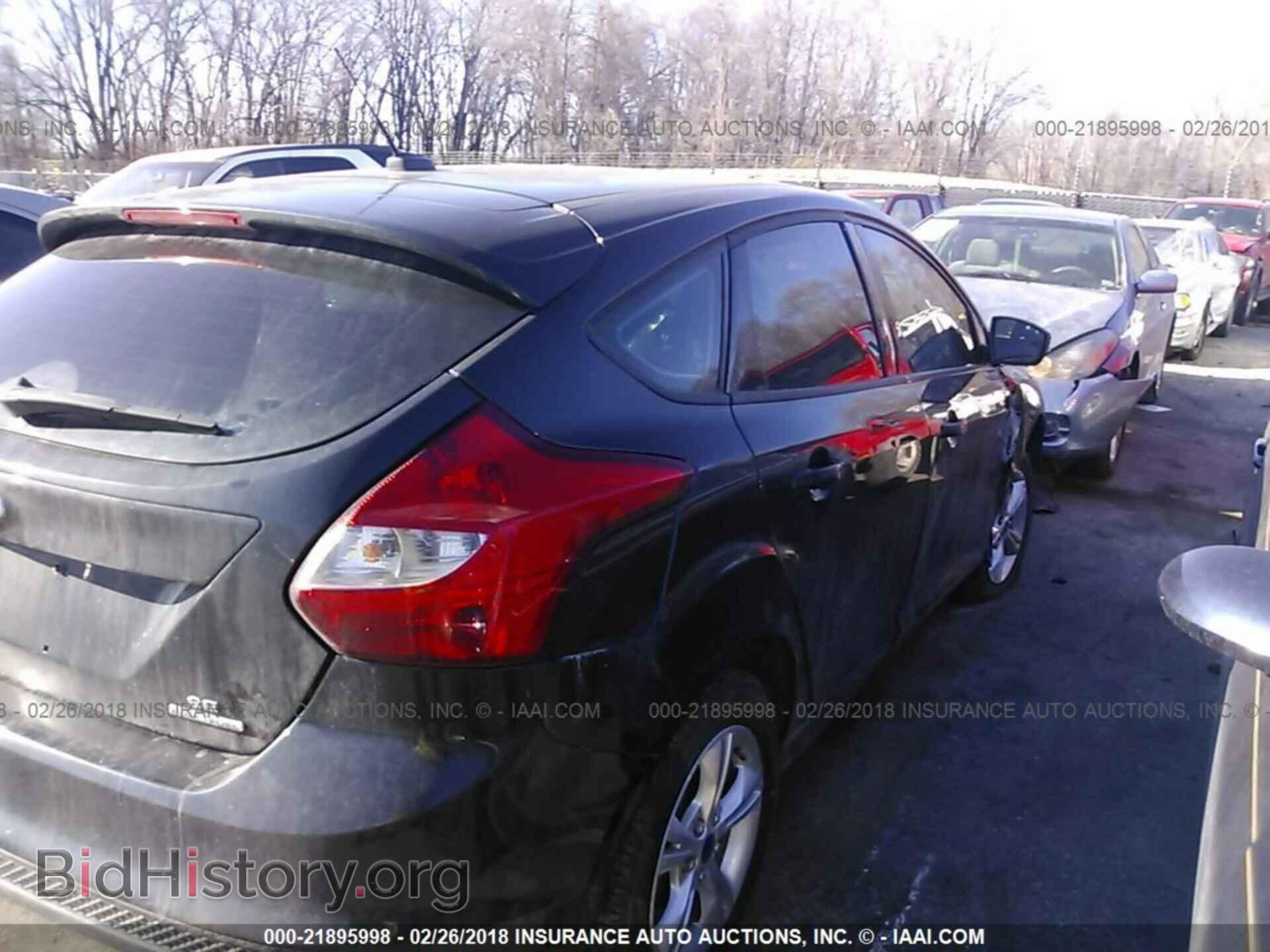 2013 Ford Focus - VIN: 1FADP3K23DL247410 - Photo 4