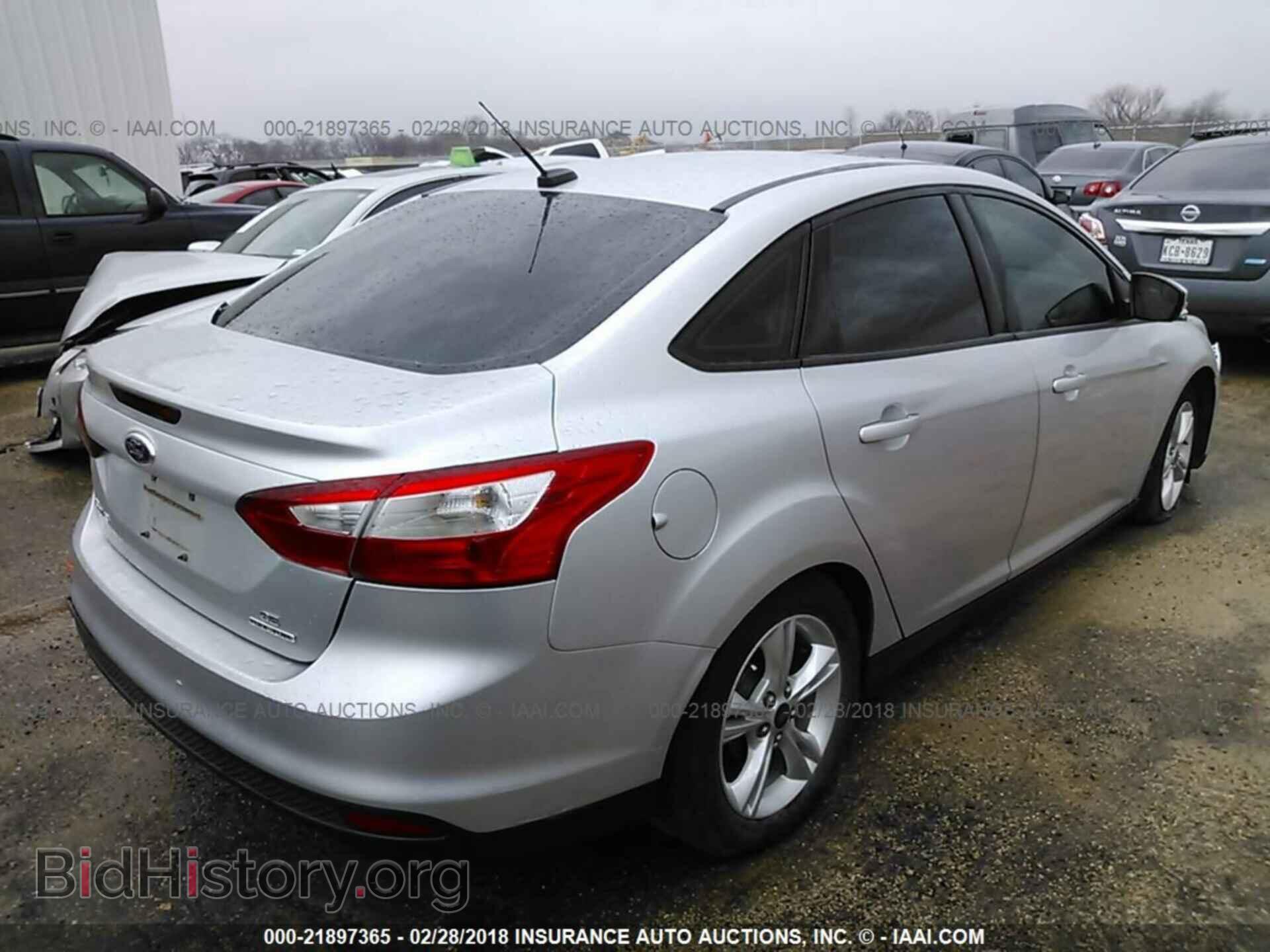 2014 Ford Focus - VIN: 1FADP3F26EL128651 - Photo 4