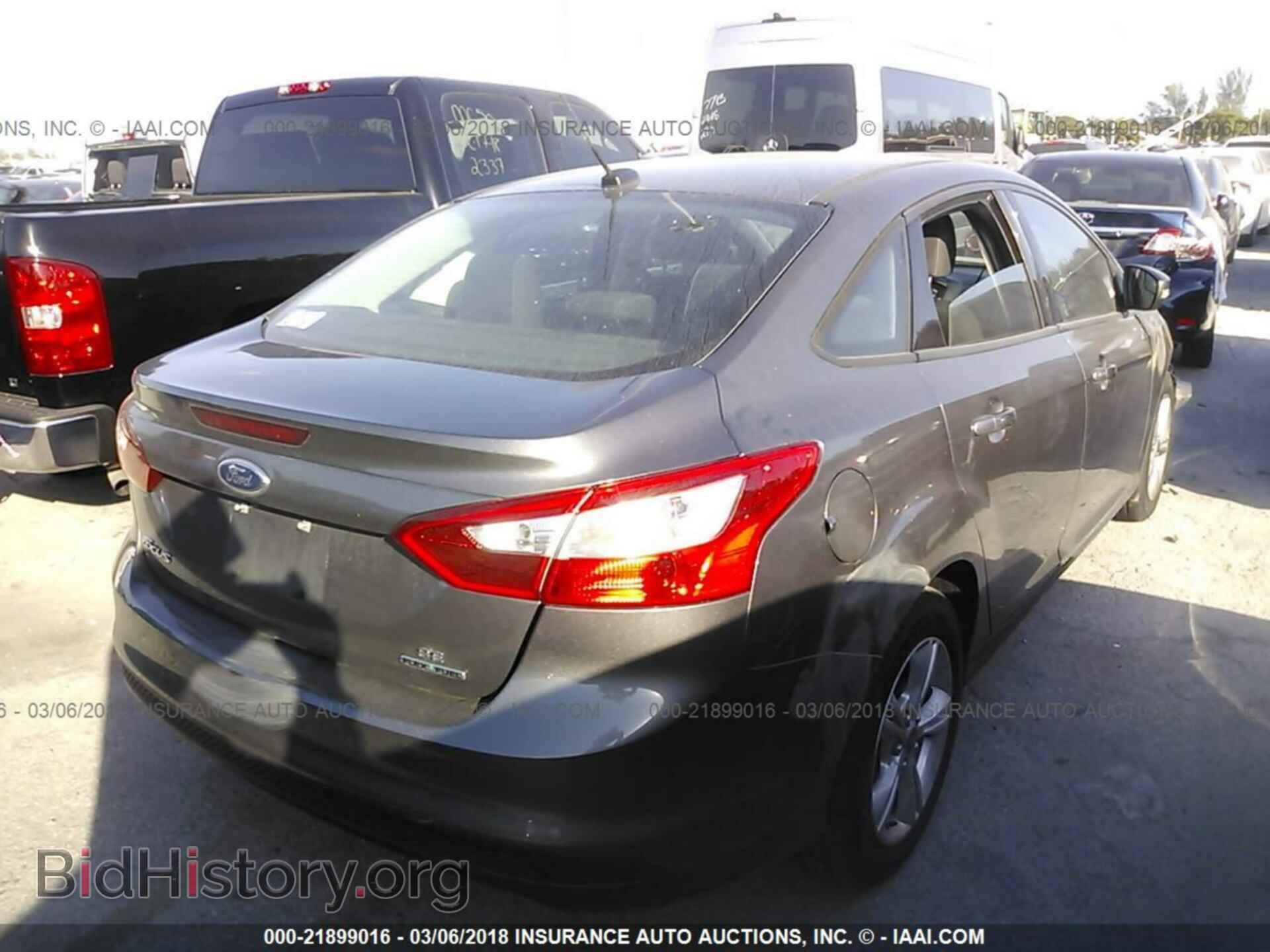 2013 Ford Focus - VIN: 1FADP3F23DL349574 - Photo 4