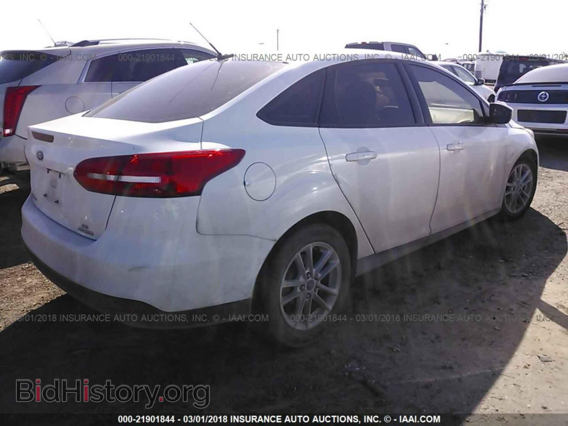 2015 Ford Focus - VIN: 1FADP3F20FL261083 - Фото 4